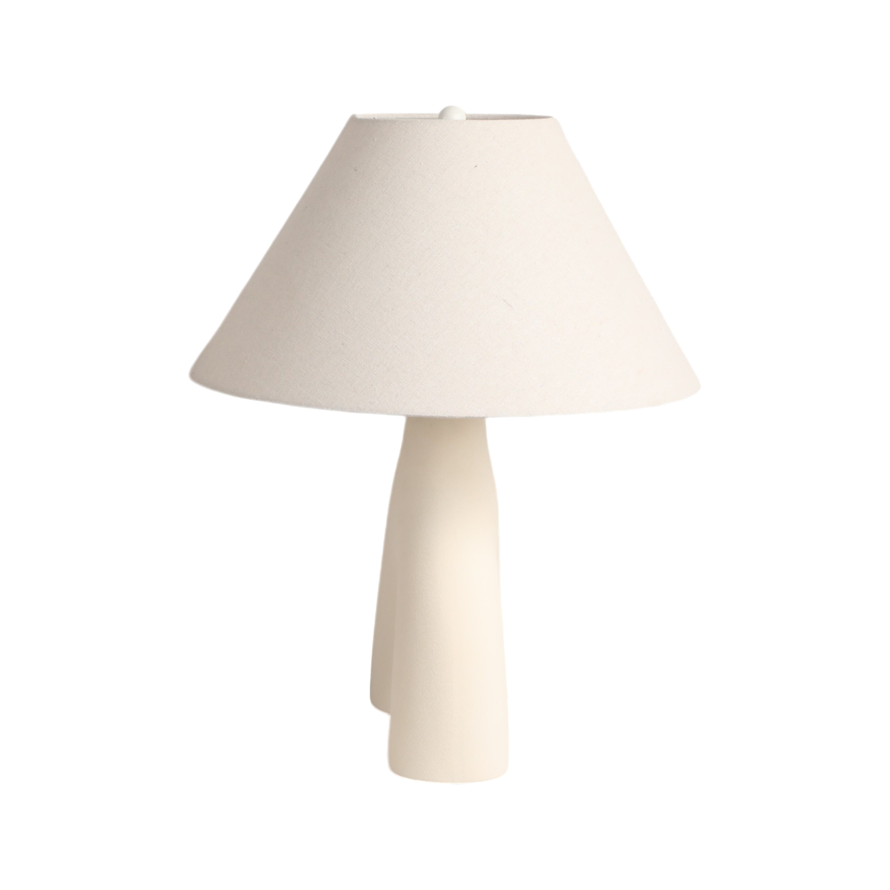 White table lamp with a beige shade on a white background