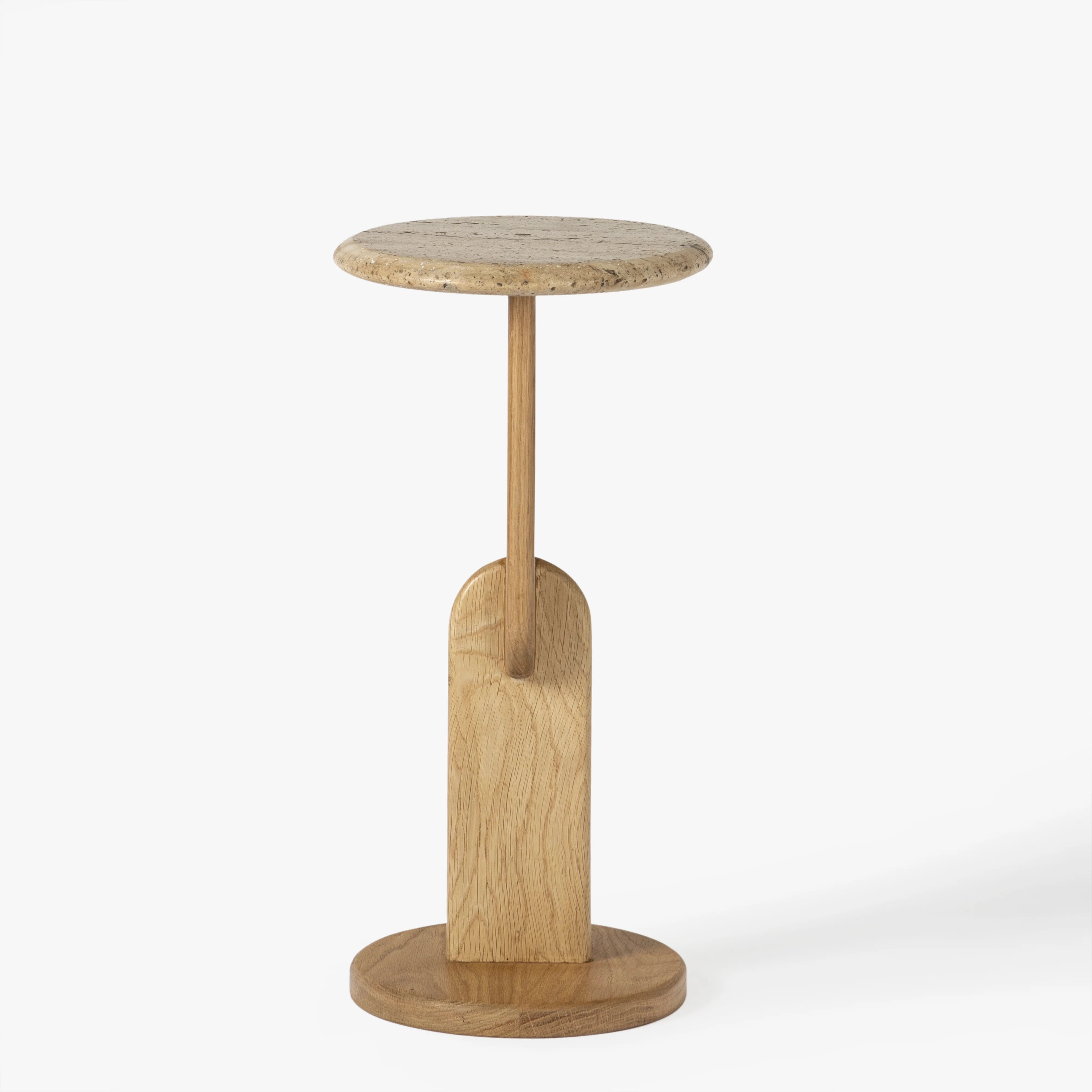A modern side table with a circular stone top, a single wooden pedestal stem, and a round wooden base, shown on a clean white background.