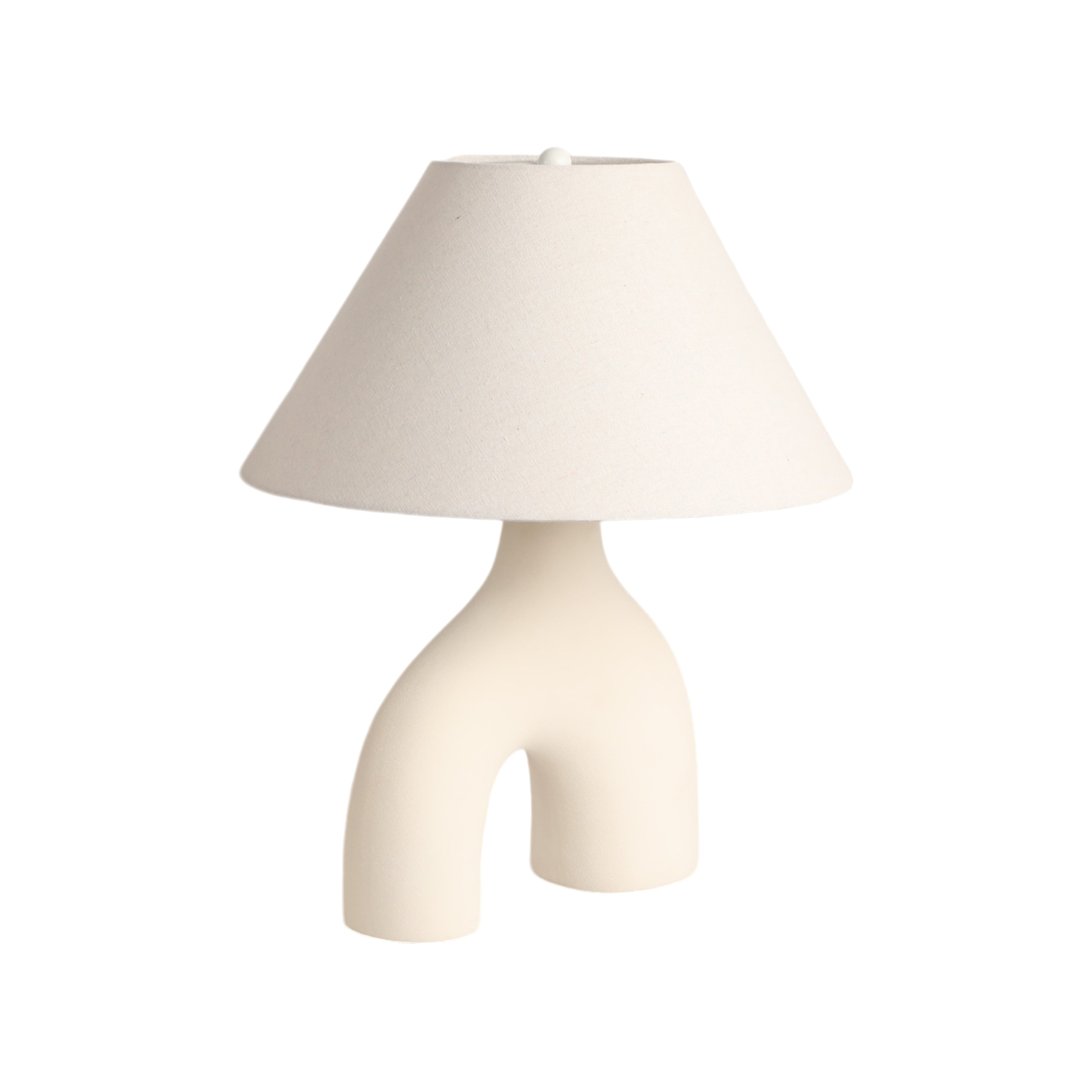 White table lamp with a unique base design on a white background