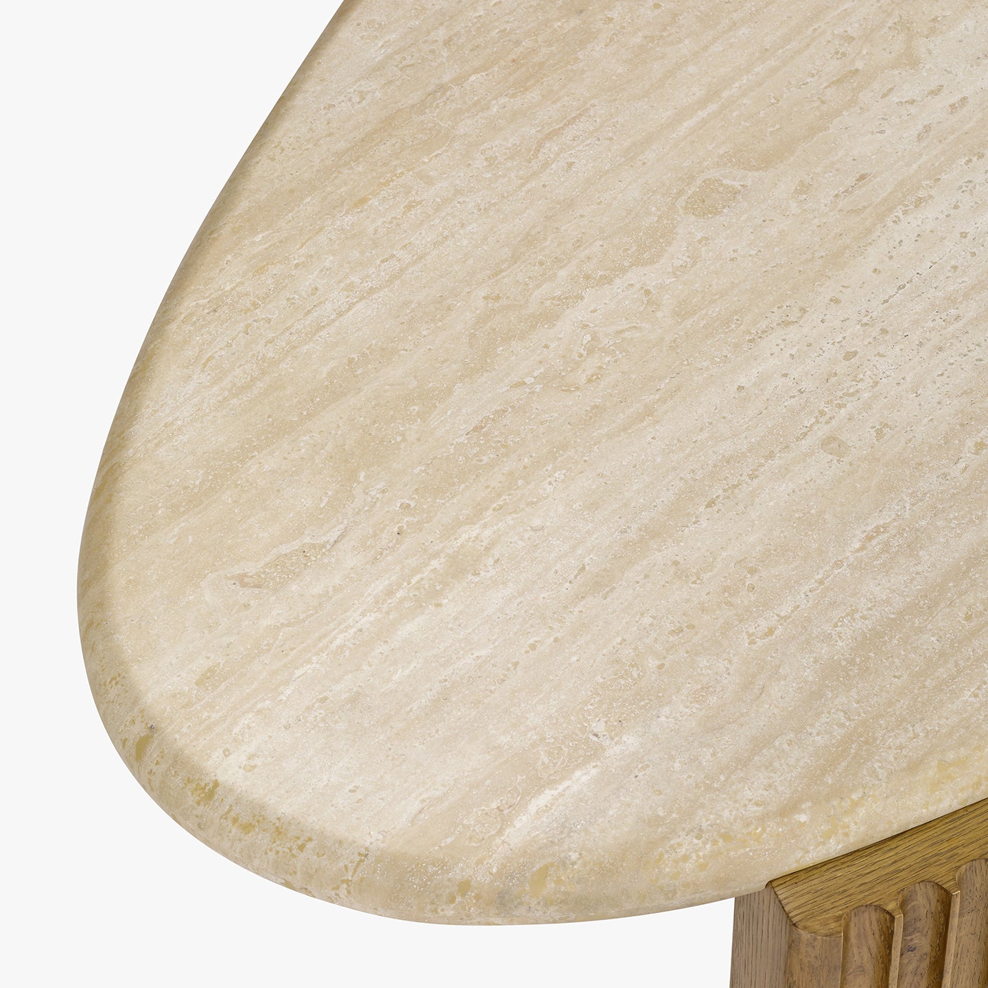 Close-up of a beige stone table top with a white background