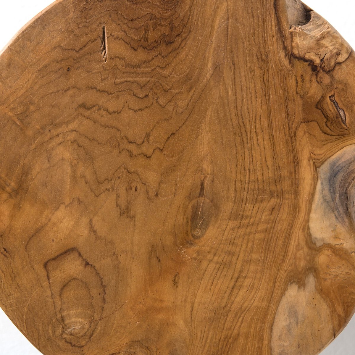 Close-up of a wooden end table with natural grain and texture