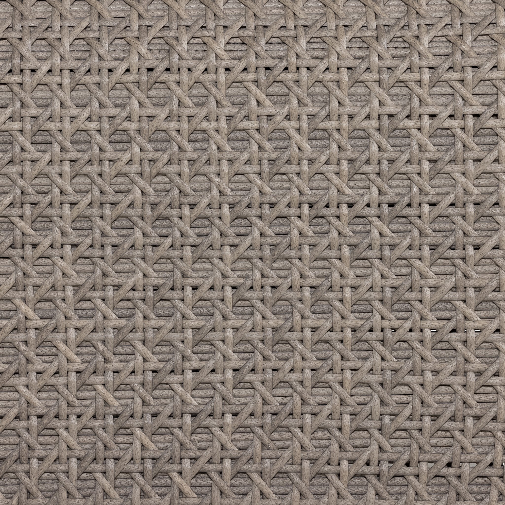 Close-up of a textured brown fabric with a geometric pattern