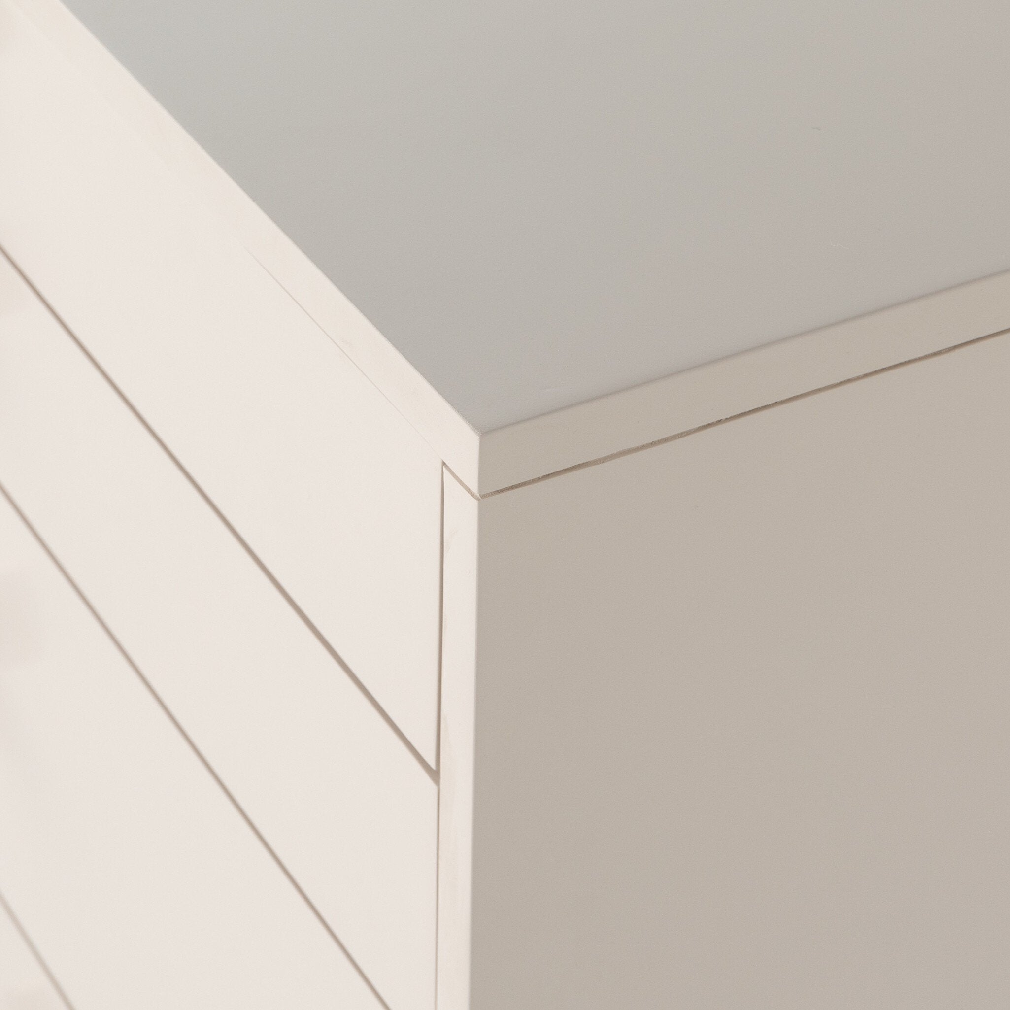 Dreamy off-white dresser with stainless steel base and spacious drawer design