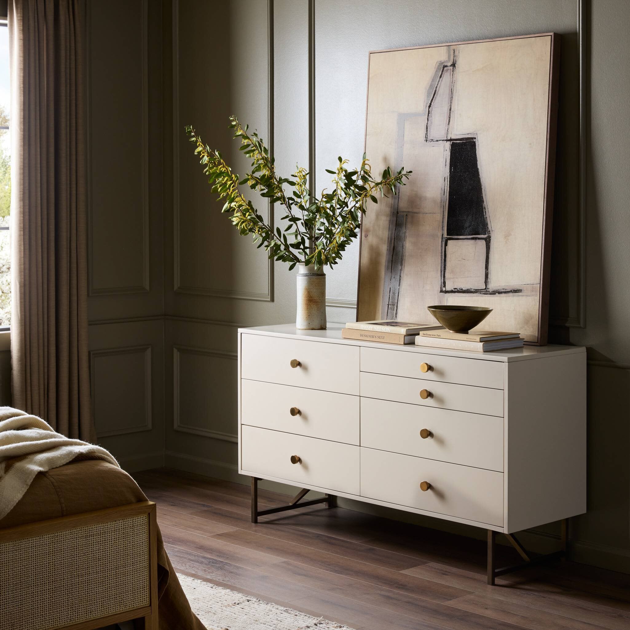 Modern dresser in dreamy off-white with velvet-lined jewelry drawers and stainless steel base