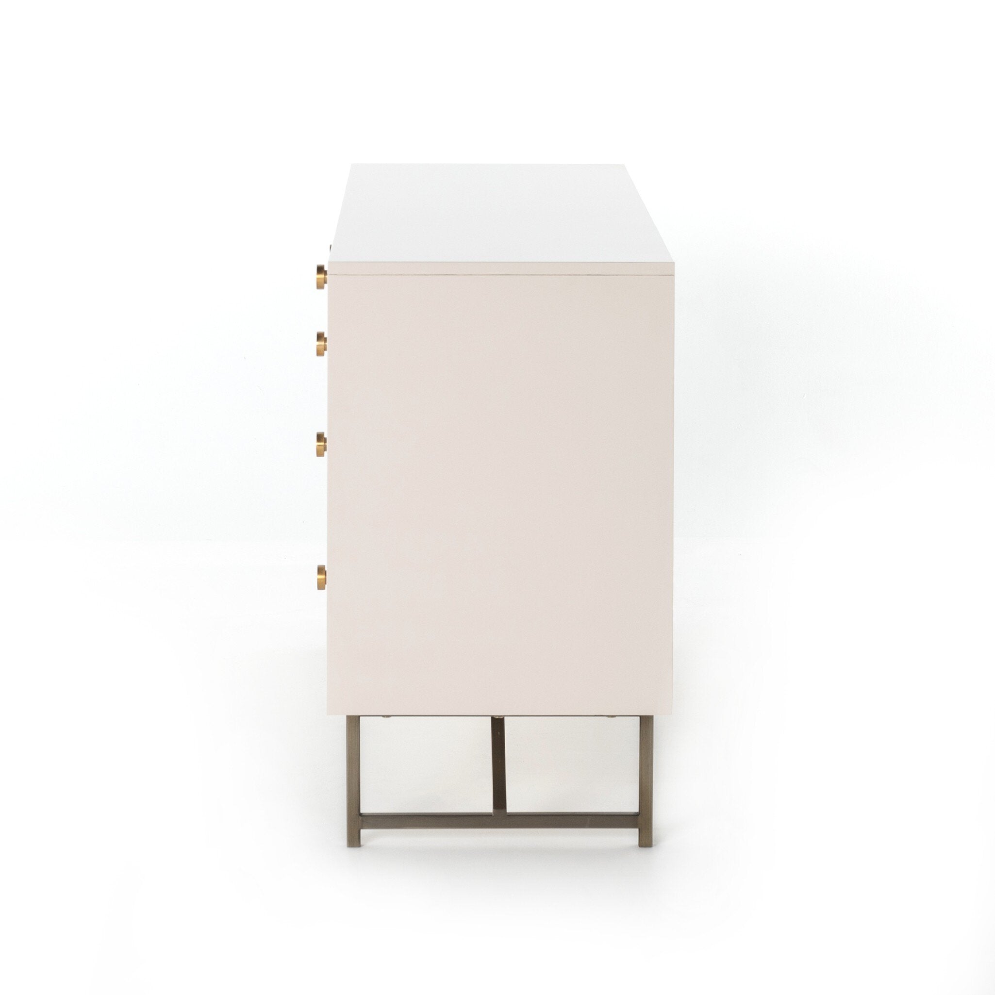 Elegant 7-drawer dresser in off-white with aged brass hardware and jewelry storage