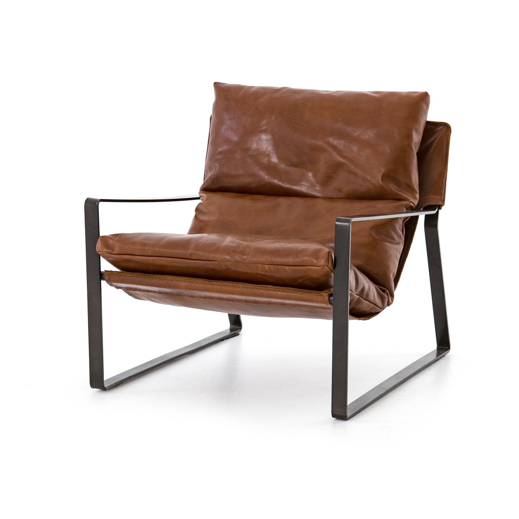 Brown leather armchair with metal frame on a white background