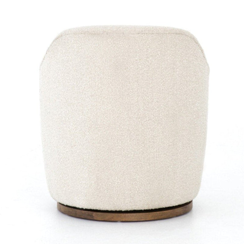 Round ottoman with textured beige fabric and wooden base on a white background