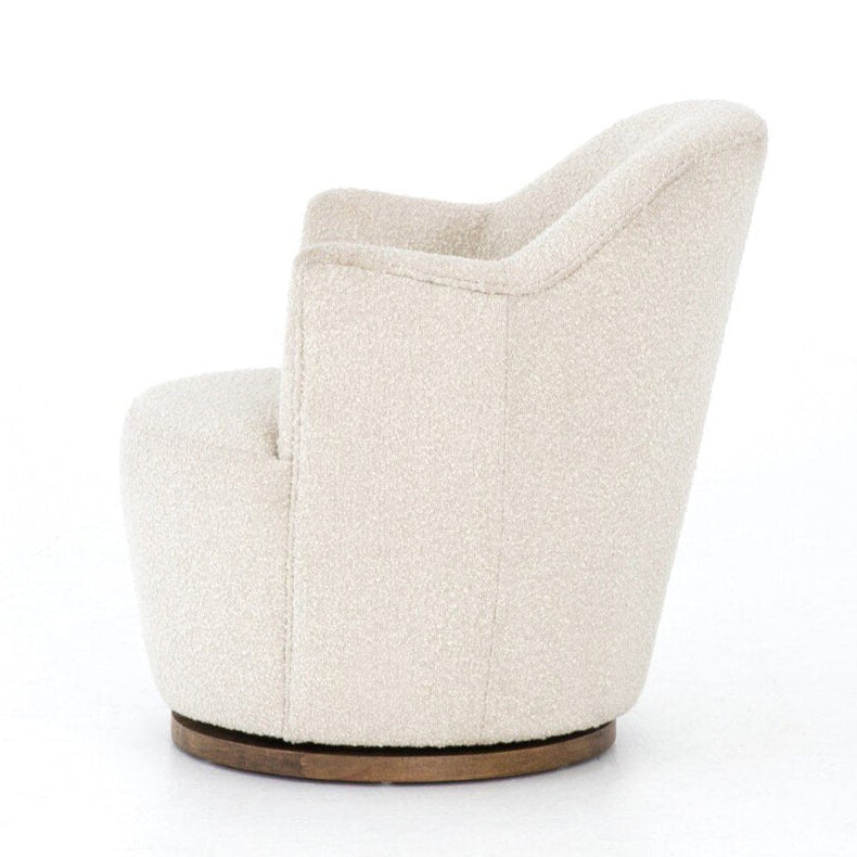 Beige armchair with wooden base on a white background