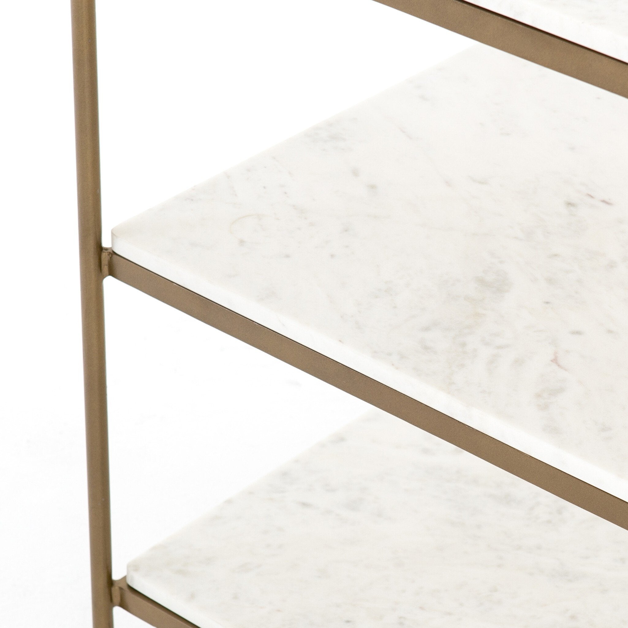 Marble shelf with gold metal frame on a white background