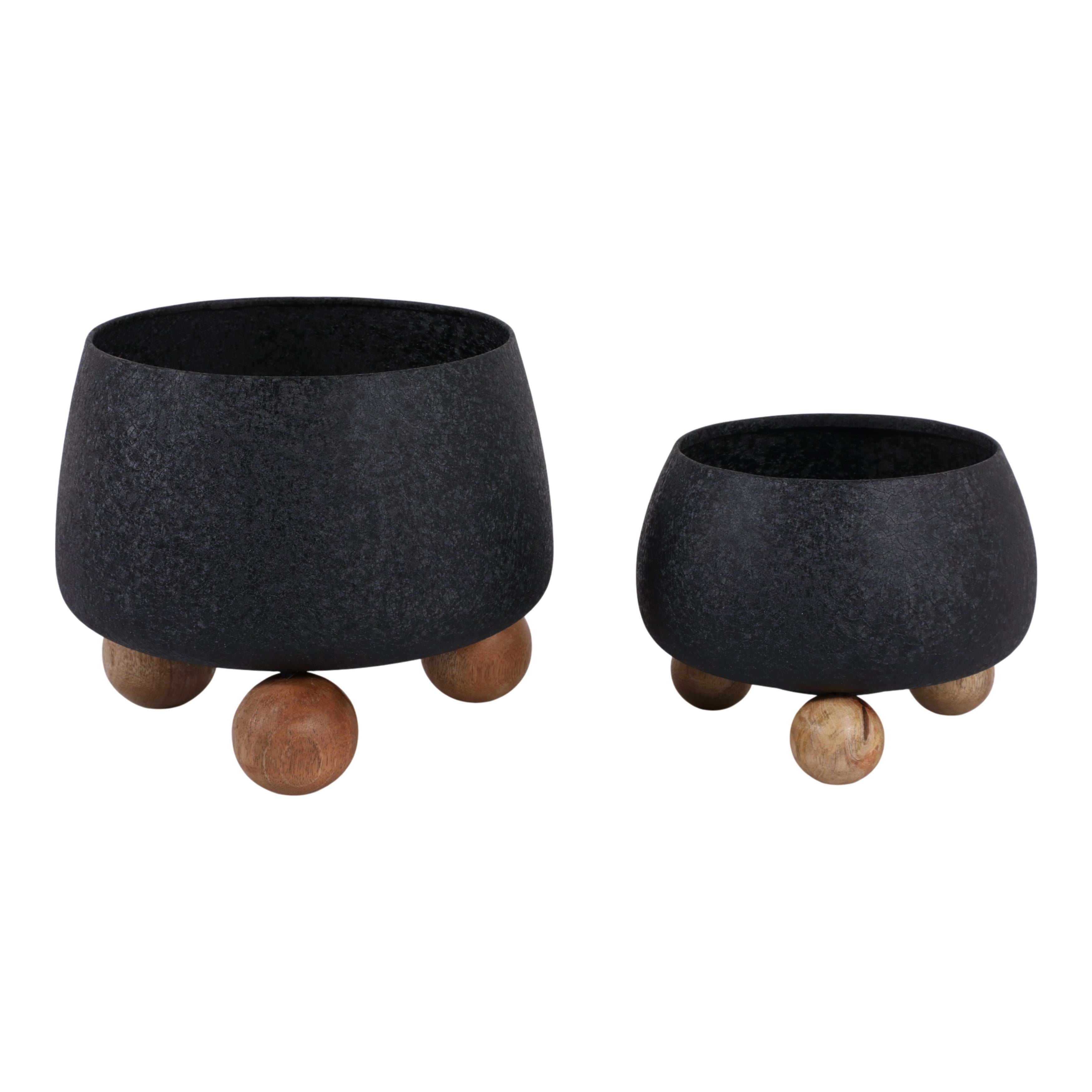 Two black planters with wooden feet on a white background