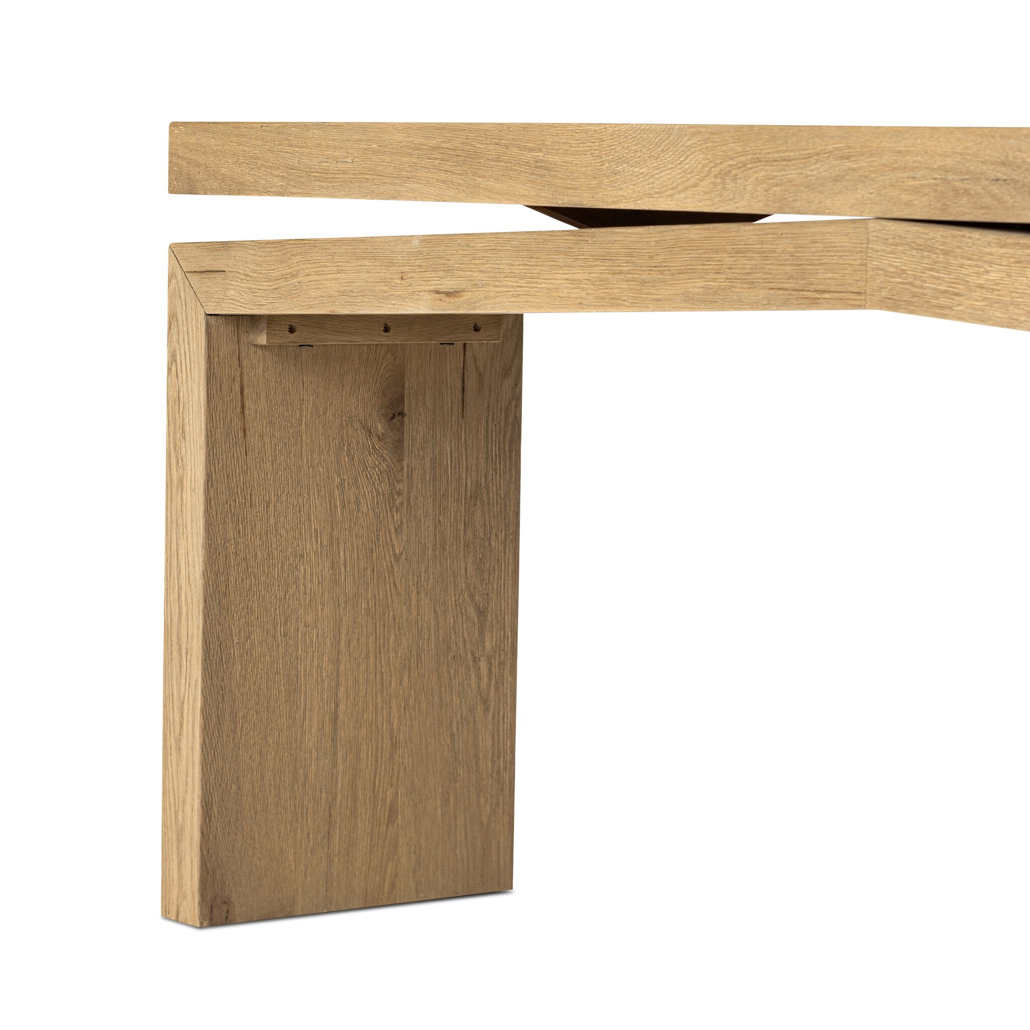 Close-up of a wooden desk corner on a white background