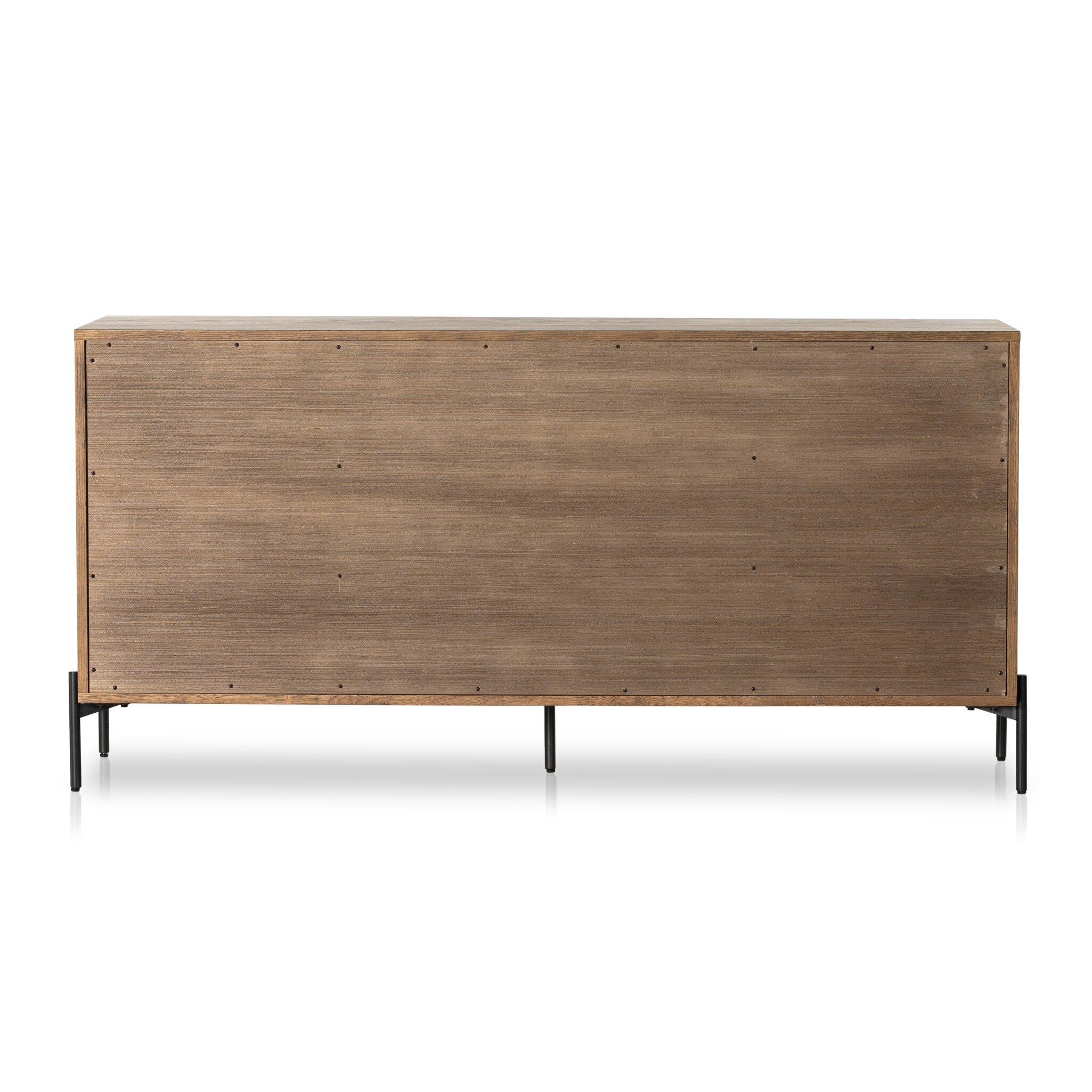 Back view of wooden dresser with metal legs on a white background