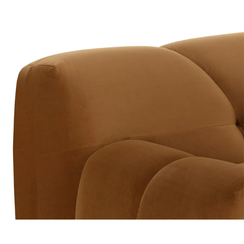 Brown sofa with a close-up of the armrest on a white background