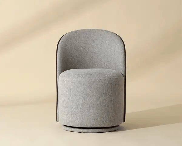 Gray upholstered chair on a beige background