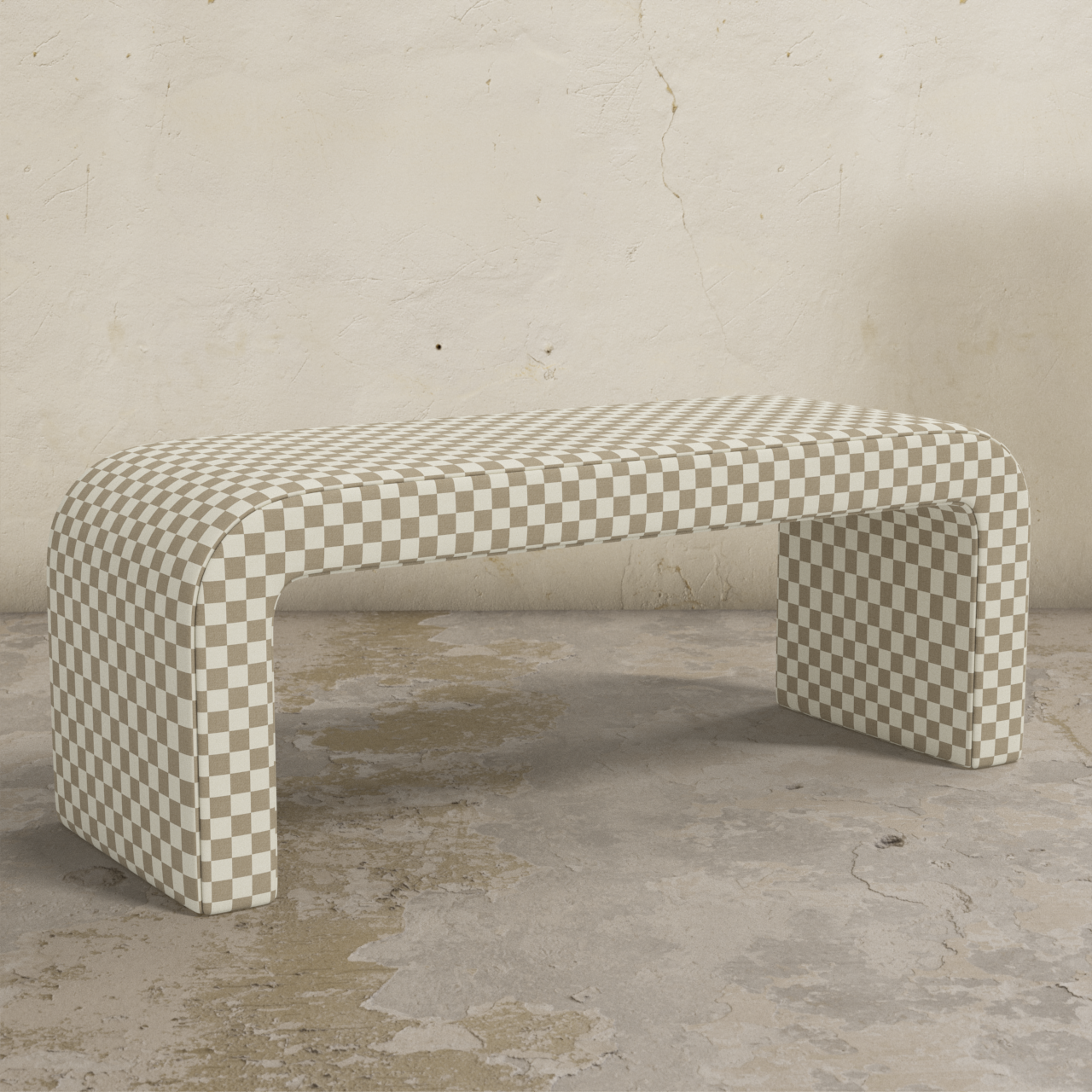 Checkered patterned bench against a textured wall.