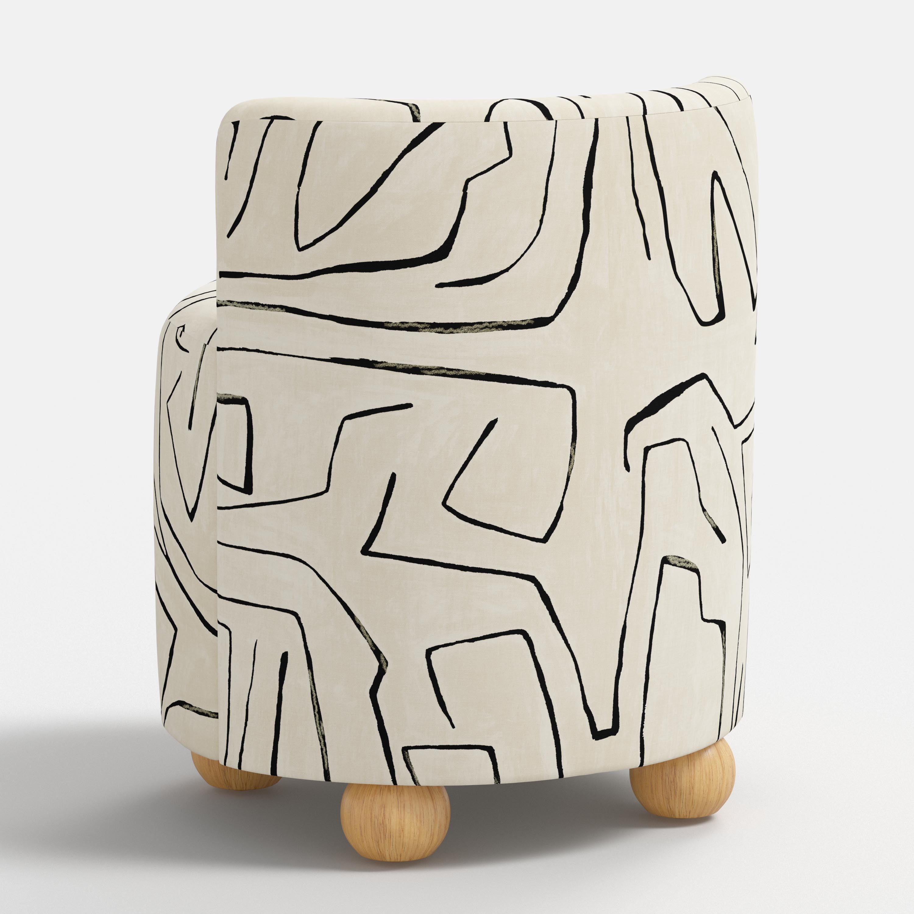 White chair with abstract black line design on a white background