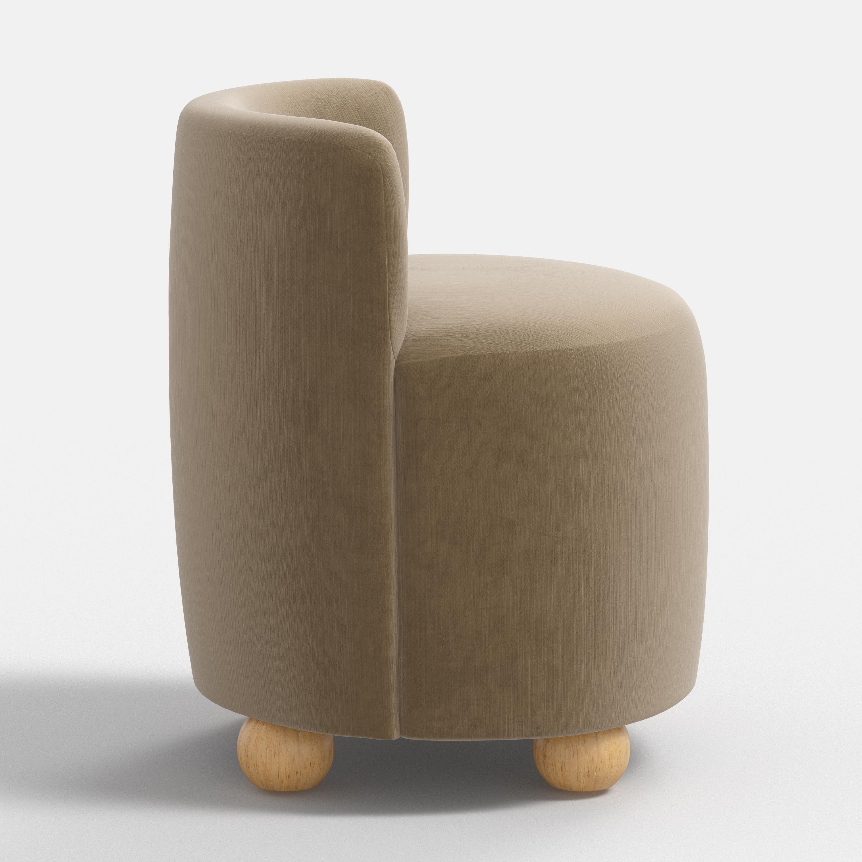 Round brown upholstered chair with wooden legs on a white background