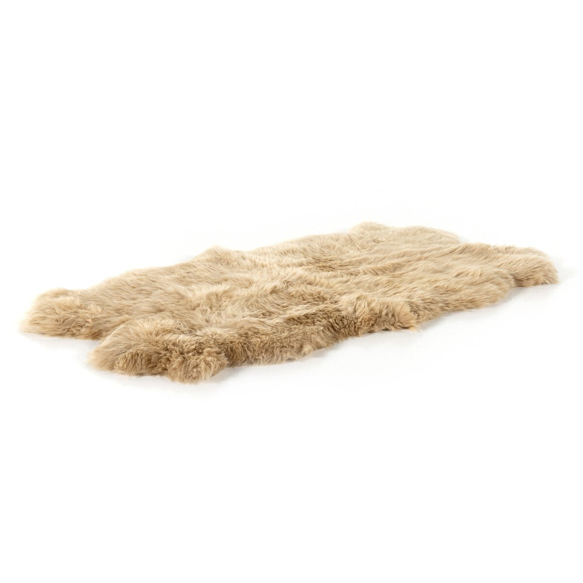 Beige sheepskin rug on a white background