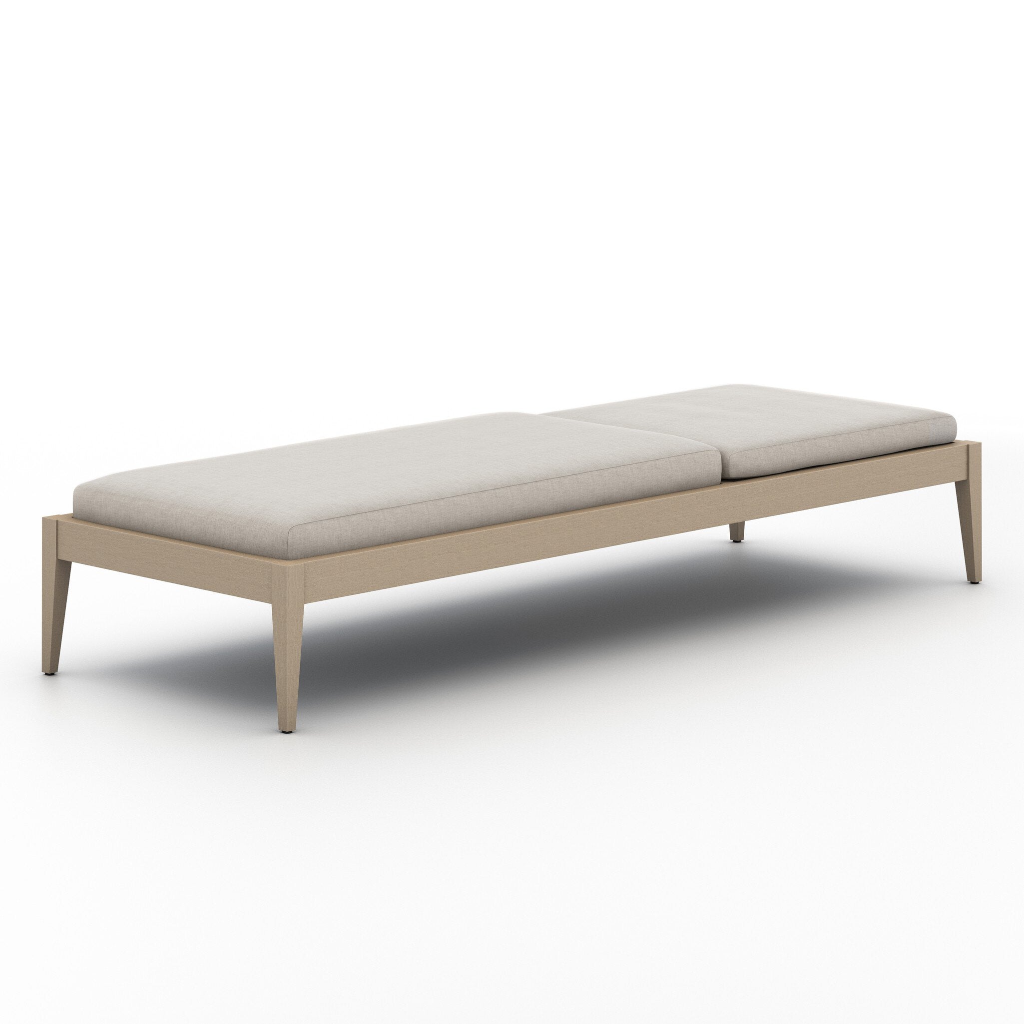 Beige outdoor chaise with cushion on a white background