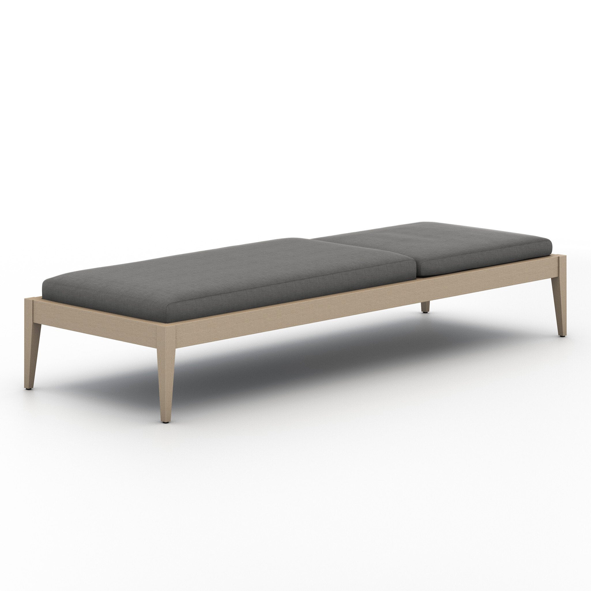 Outdoor adjustable chaise with dark cushions on a white background