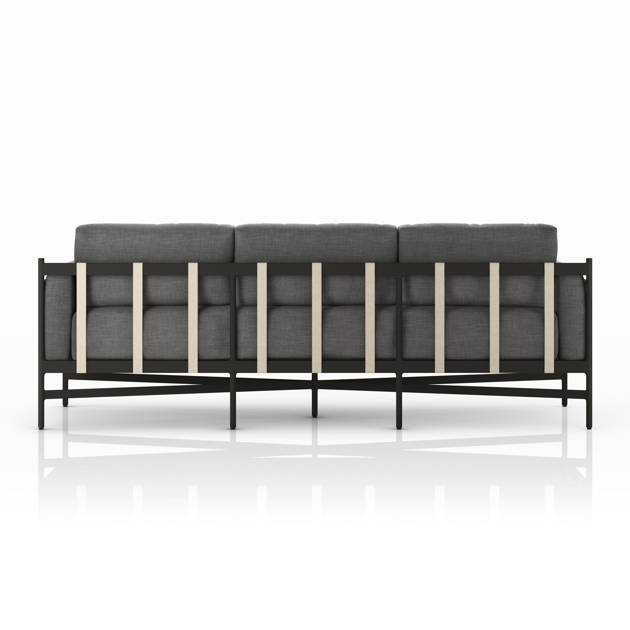 Modern outdoor sofa with black frame and gray cushions on a white background