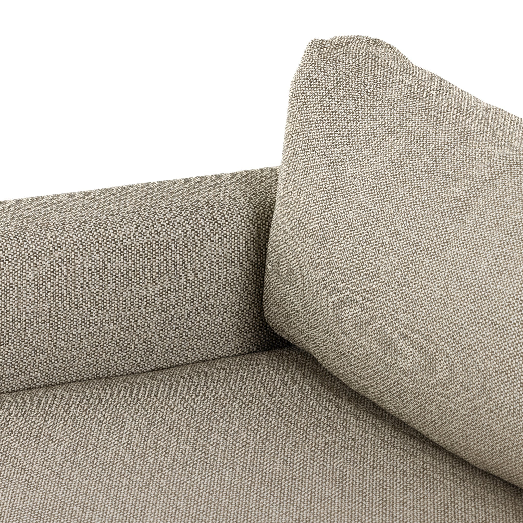 Close-up of a textured gray sofa with a white background