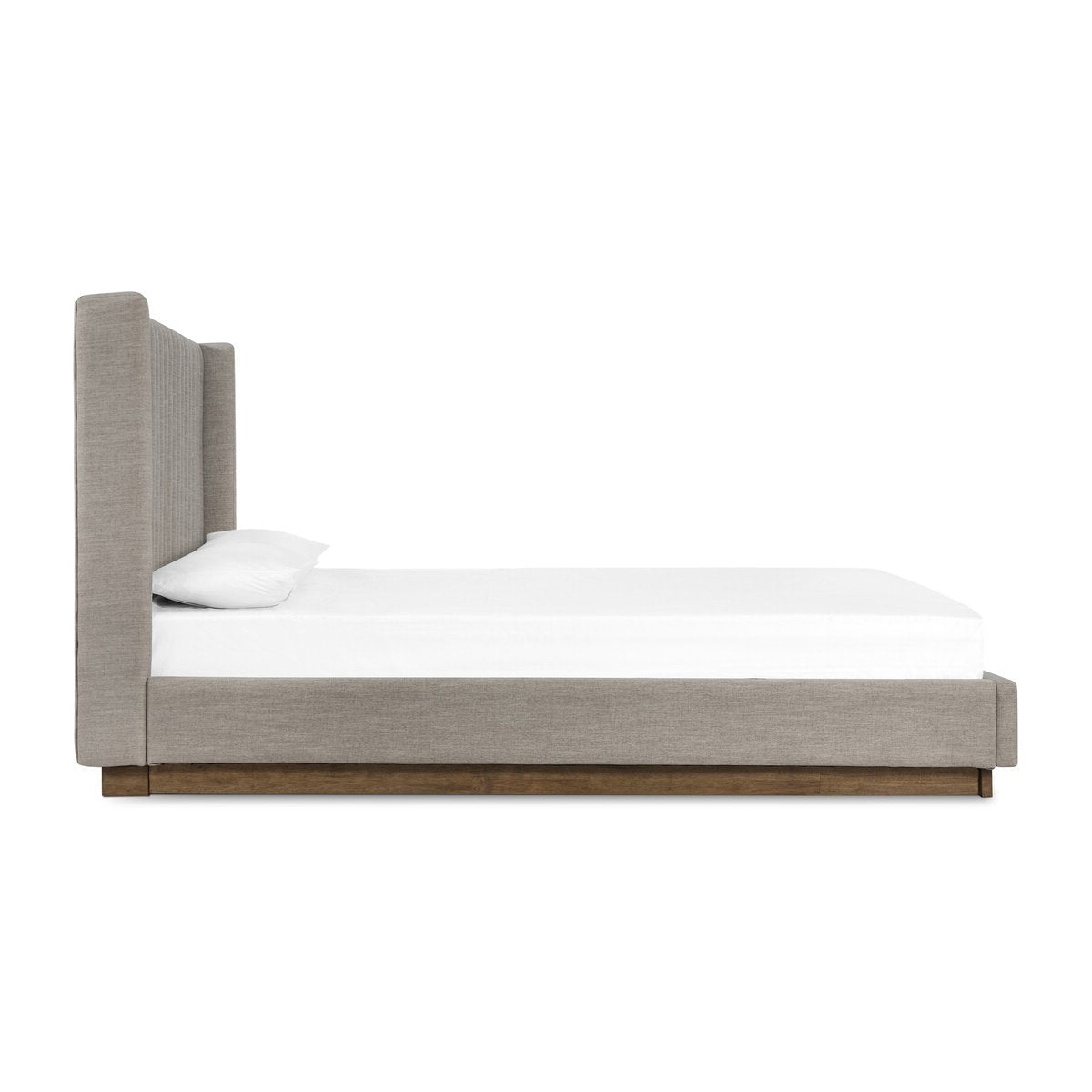 Bed with wooden frame and white mattress