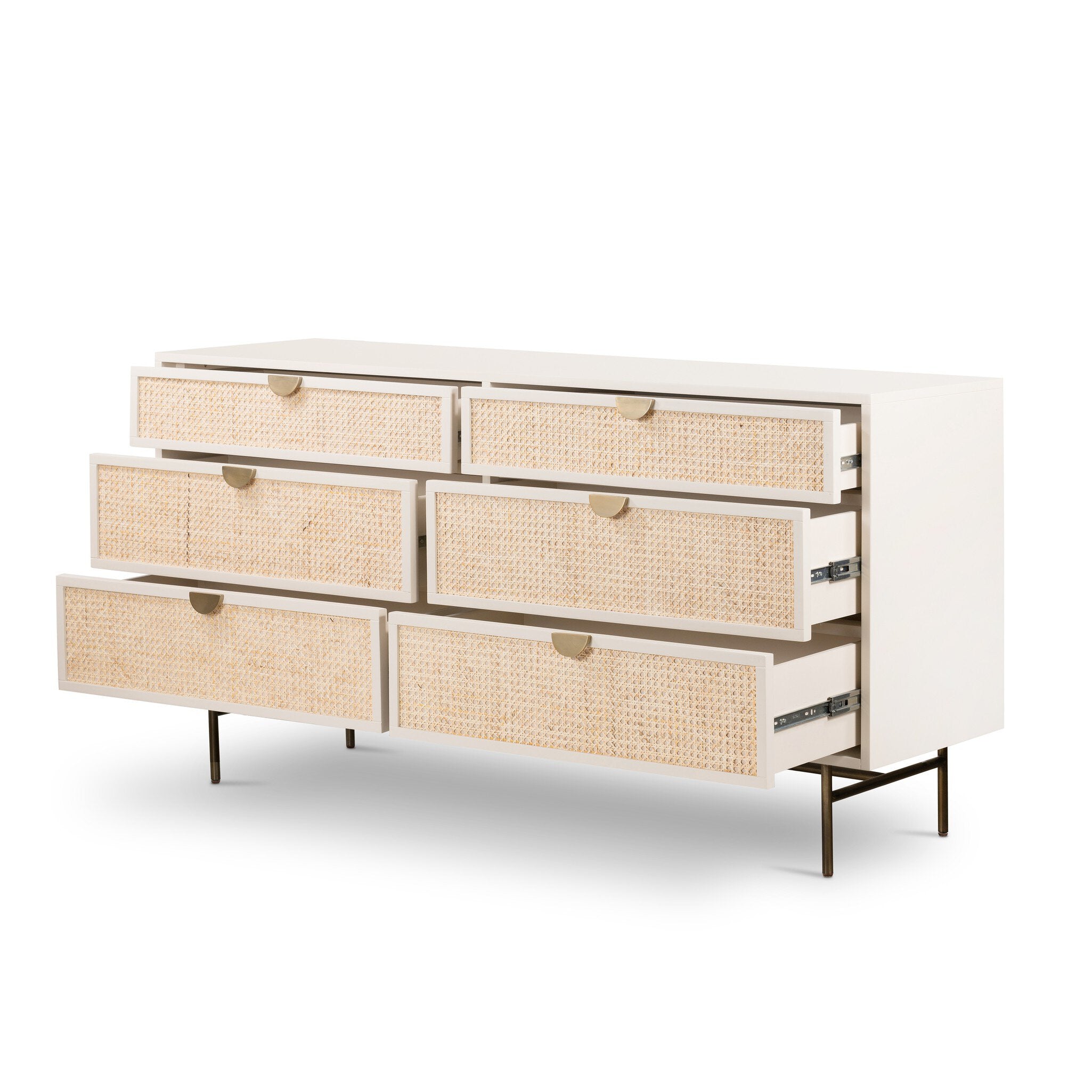 White dresser with wicker drawers on a white background