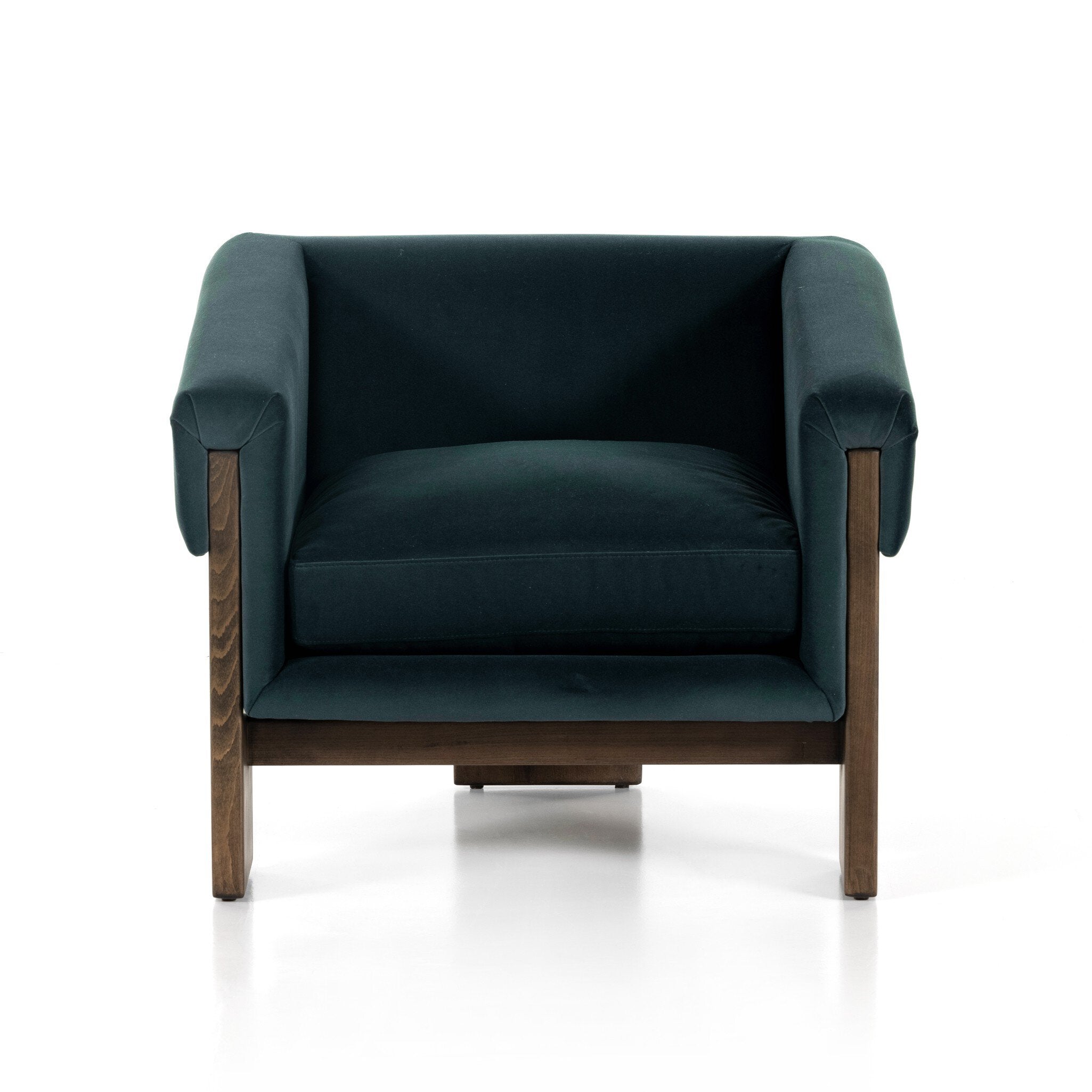 Blue armchair with wooden legs on a white background