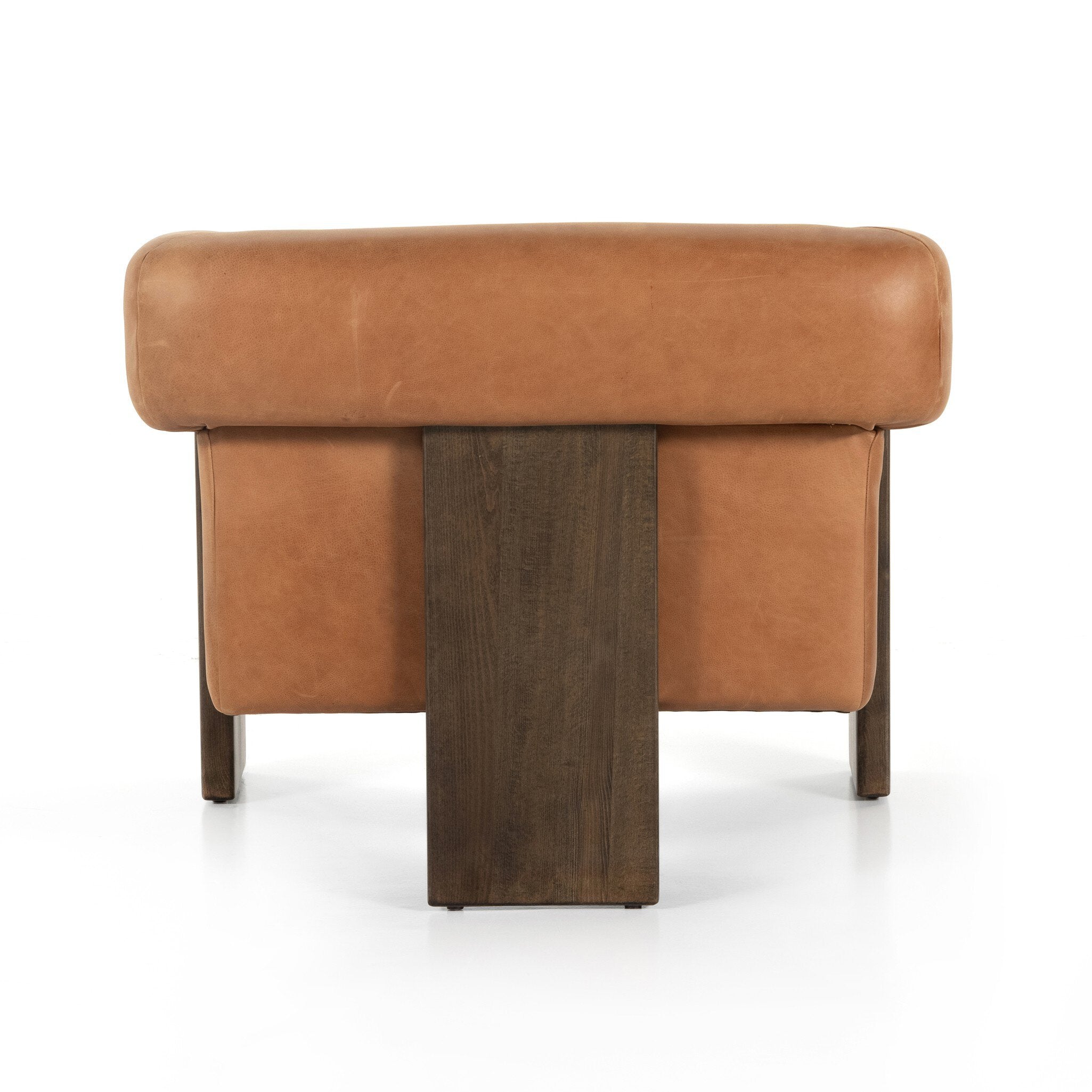 Brown leather ottoman with wooden legs on a white background
