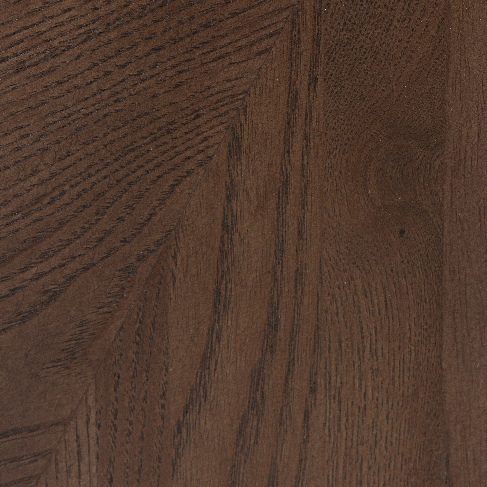 Close-up of a wooden surface with visible grain and texture