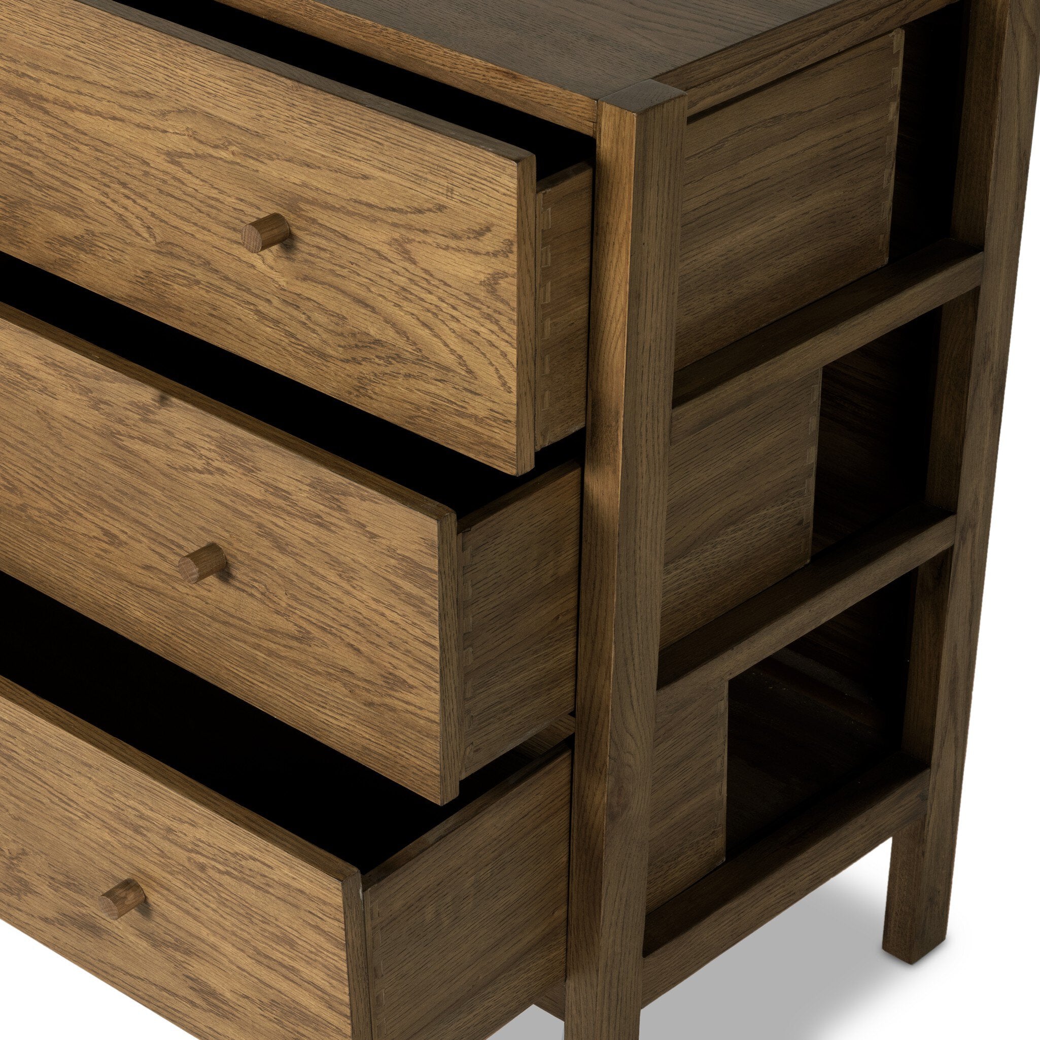 Wooden dresser with multiple drawers on a white background