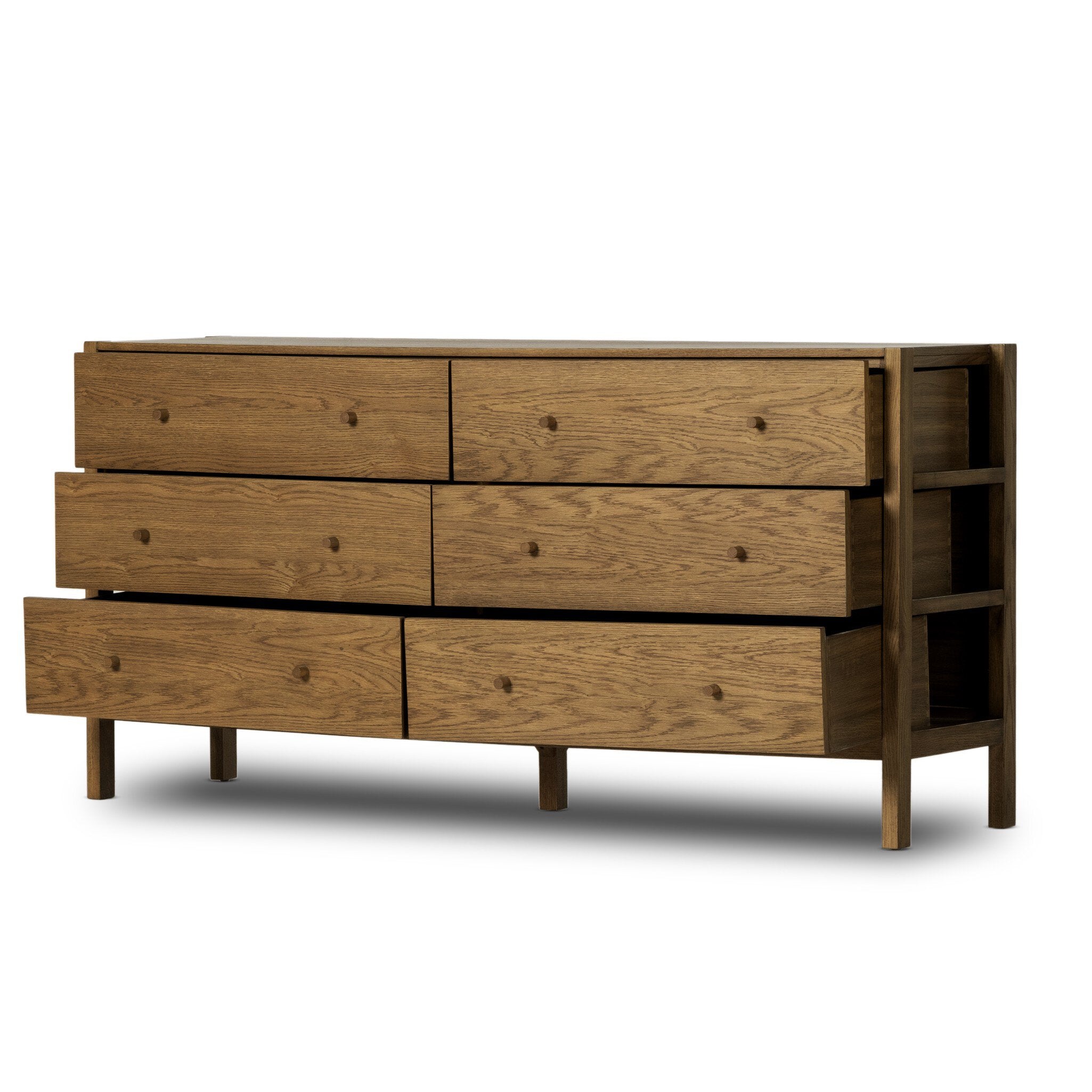 Wooden dresser with multiple drawers on a white background
