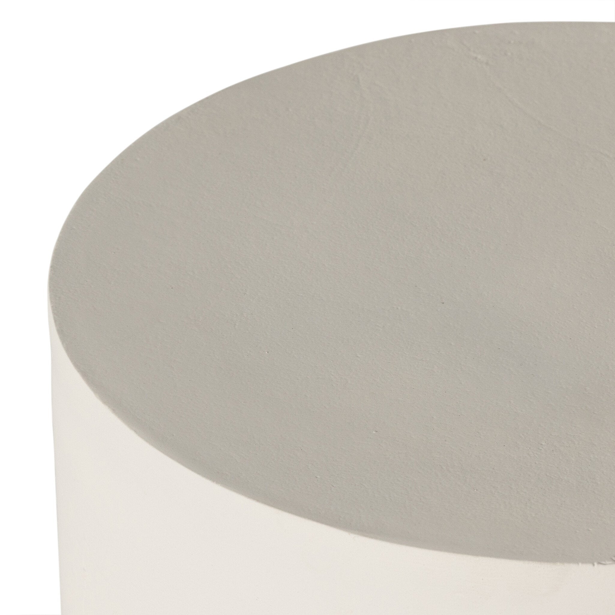 Round gray table top on a white background