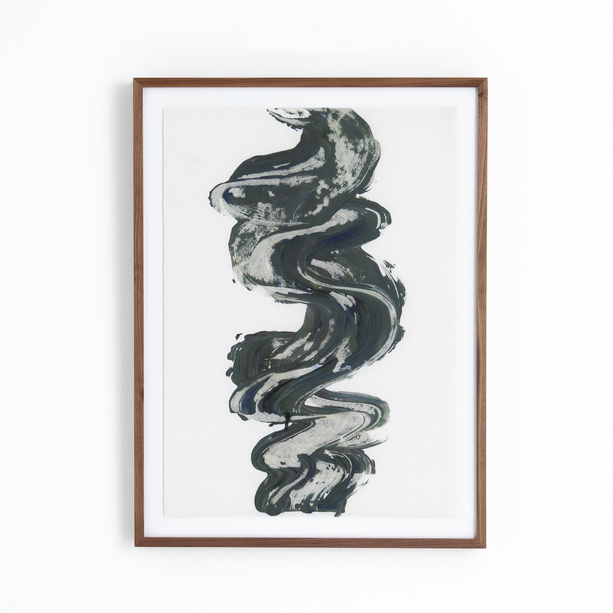 Framed abstract art print with green brushstroke design on a white background