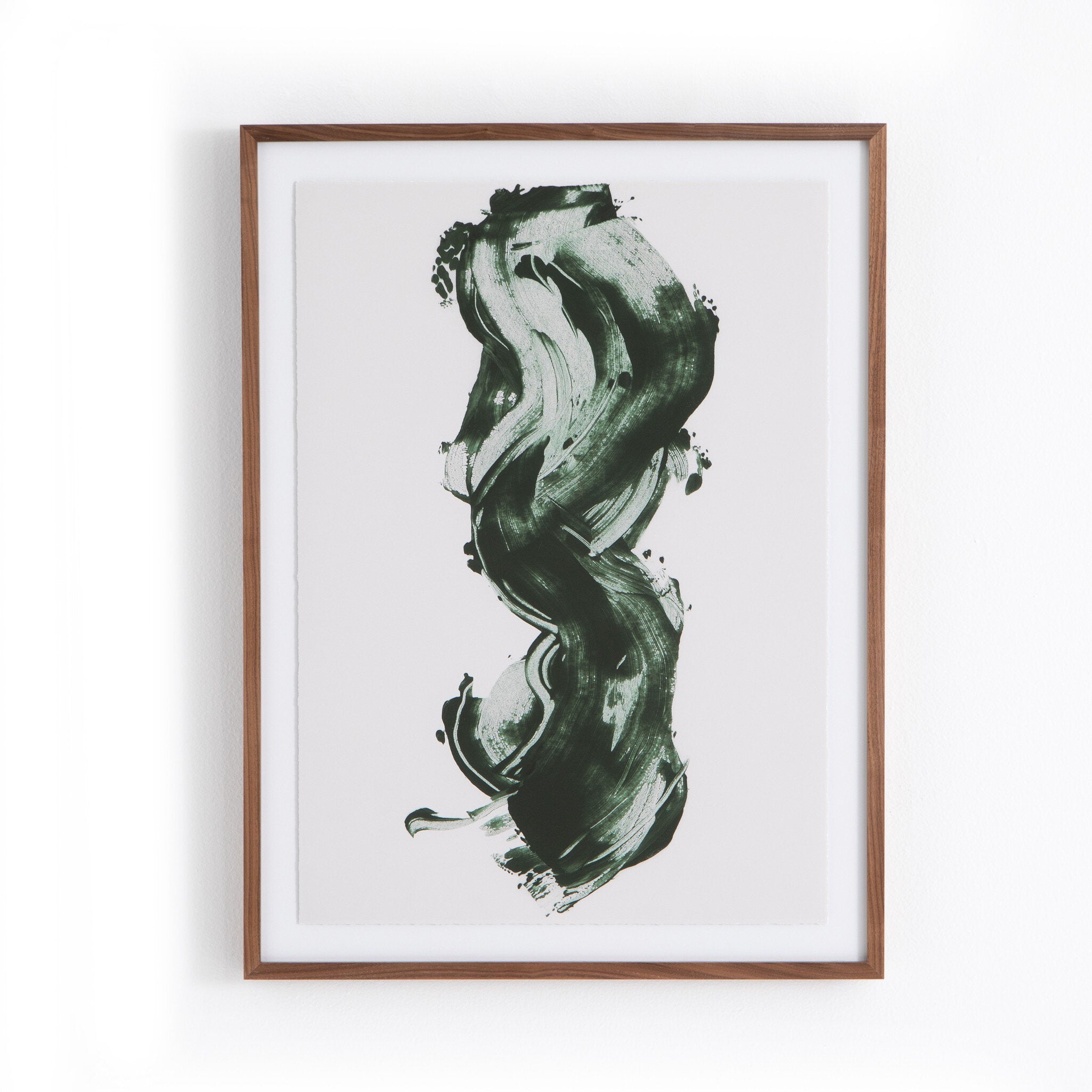 Framed abstract artwork with wavy green and white design on a white background