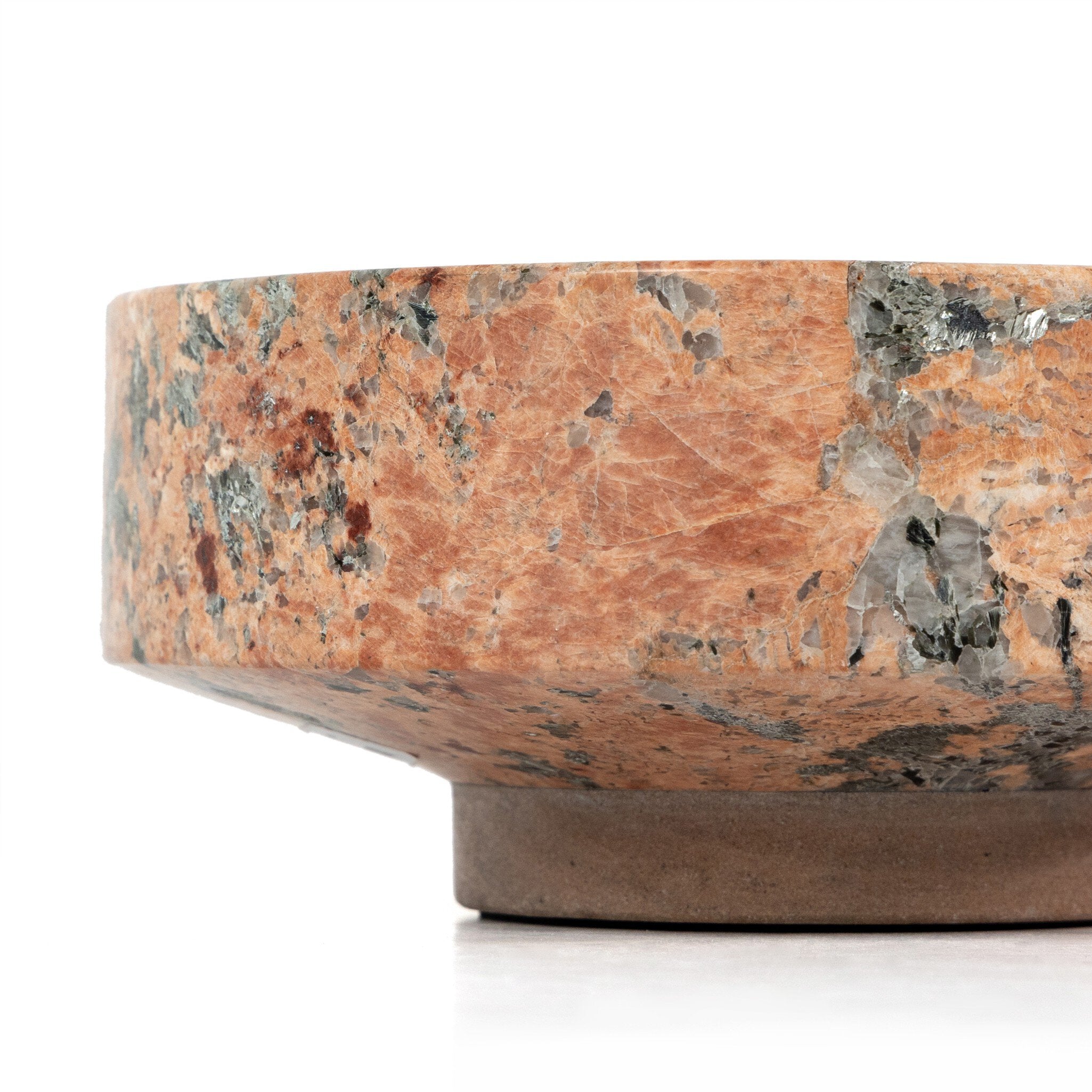 Marble-patterned stone bowl on a white background