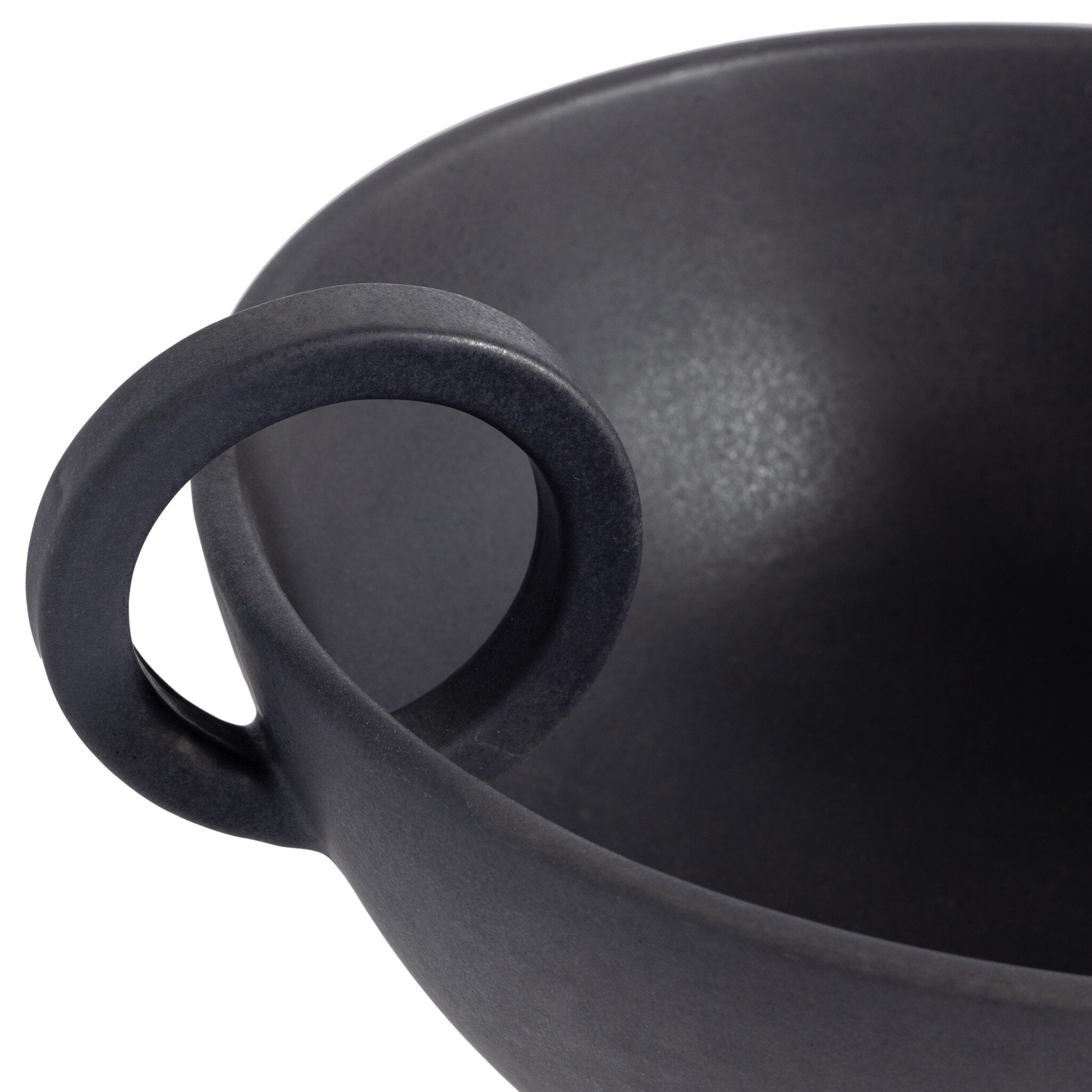 Black ceramic vessel with handles on a white background