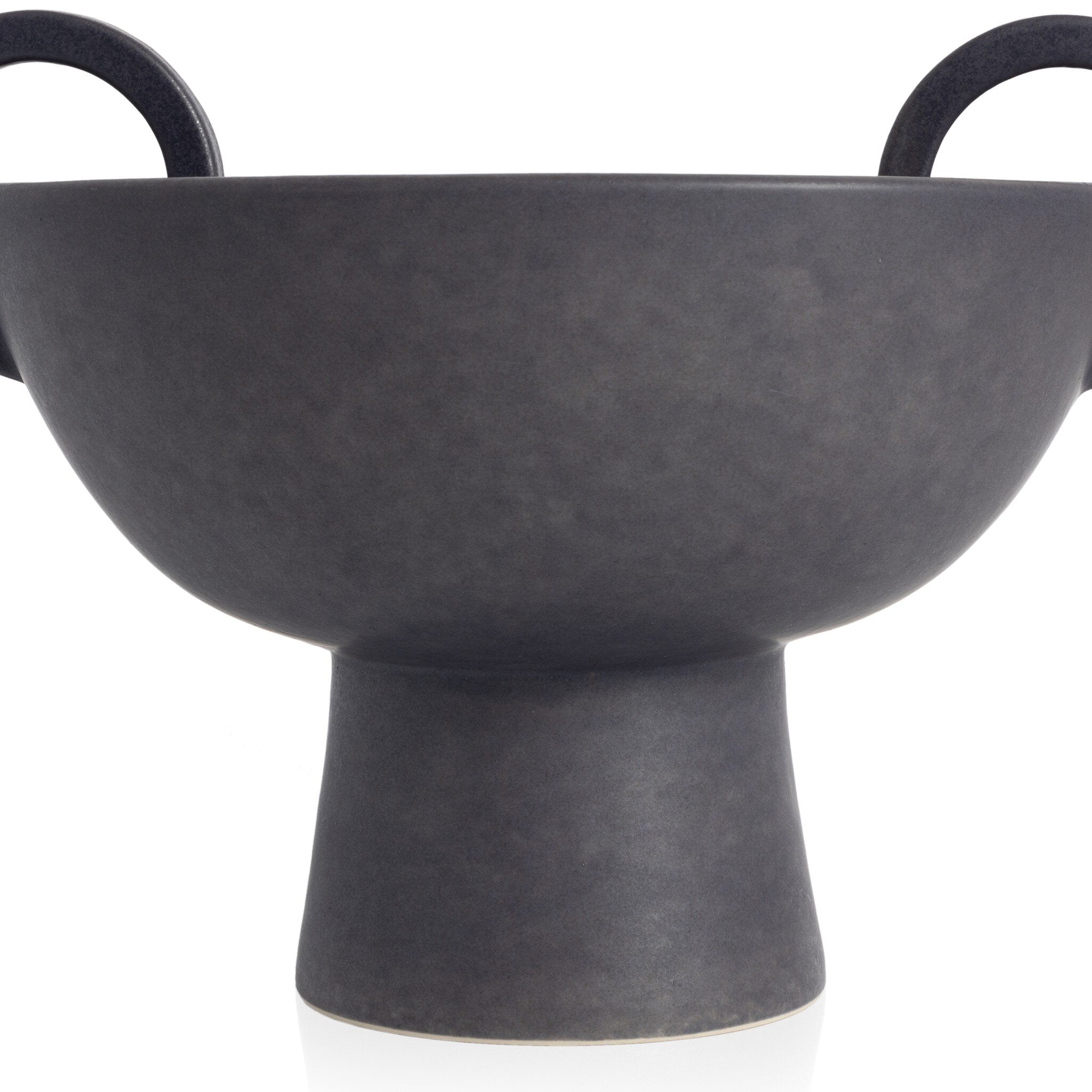 Black ceramic vessel with handles on a white background