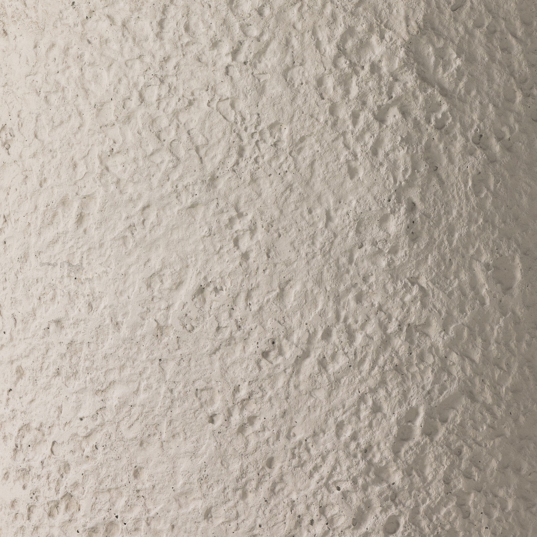 Close-up of a textured beige wall