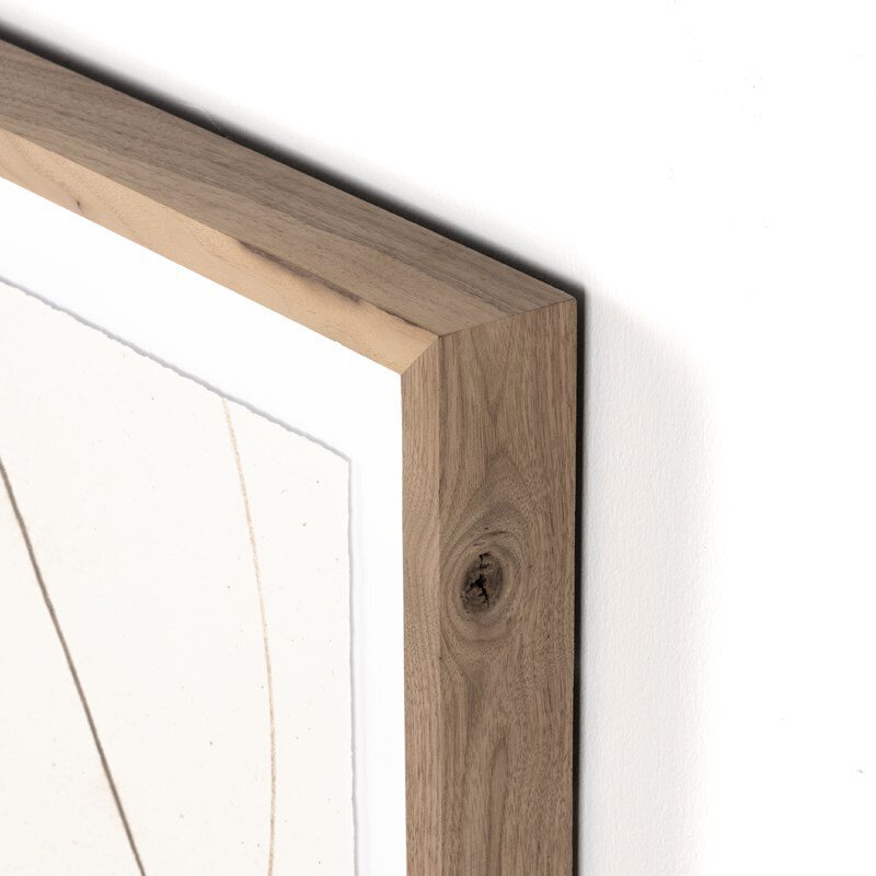 Close-up of a wooden picture frame corner on a white background