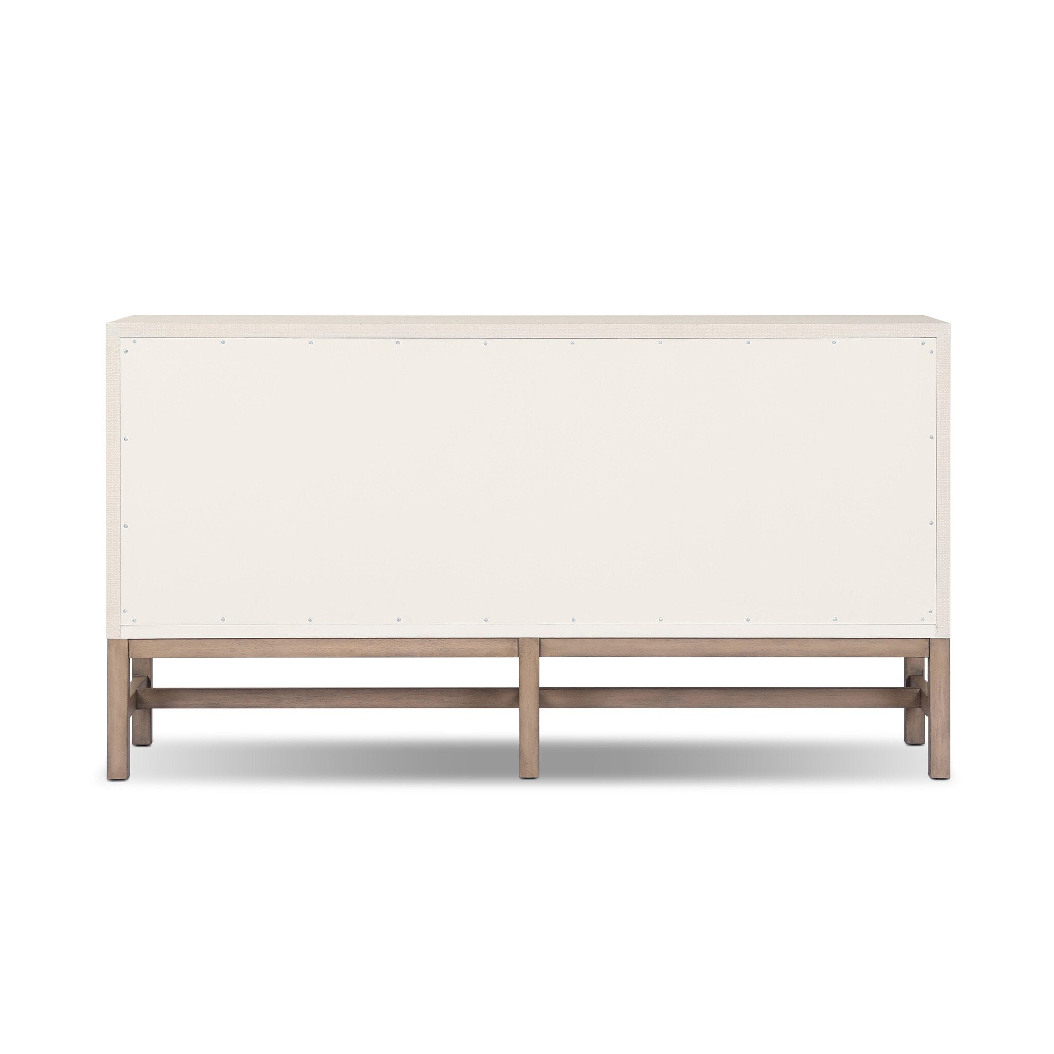 Back view of white wooden dresser on a white background