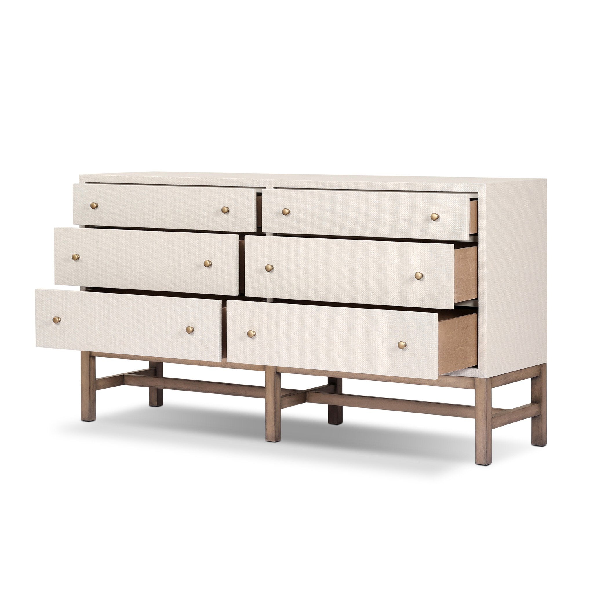 White dresser with multiple drawers on a white background