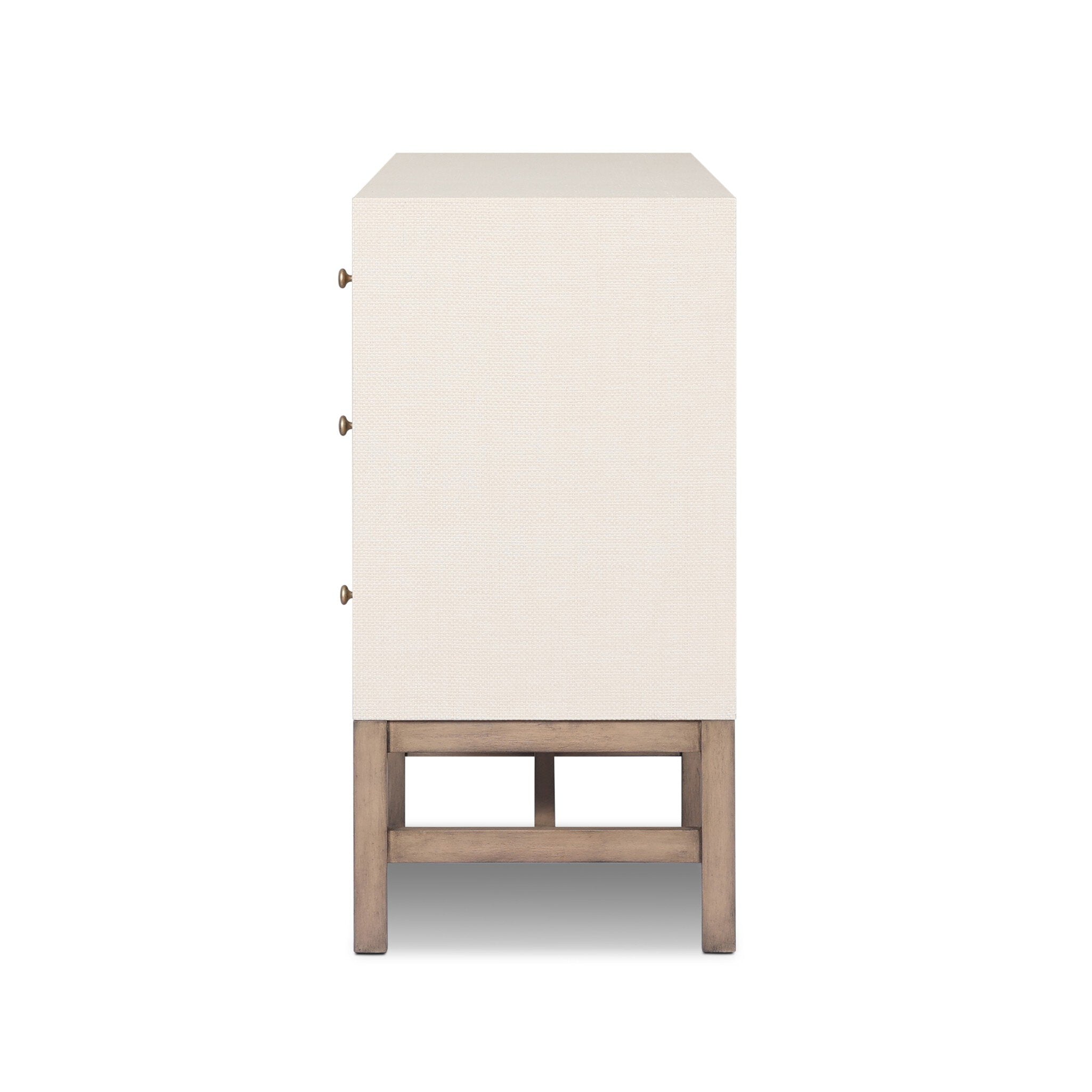 White nightstand with wooden legs on a white background