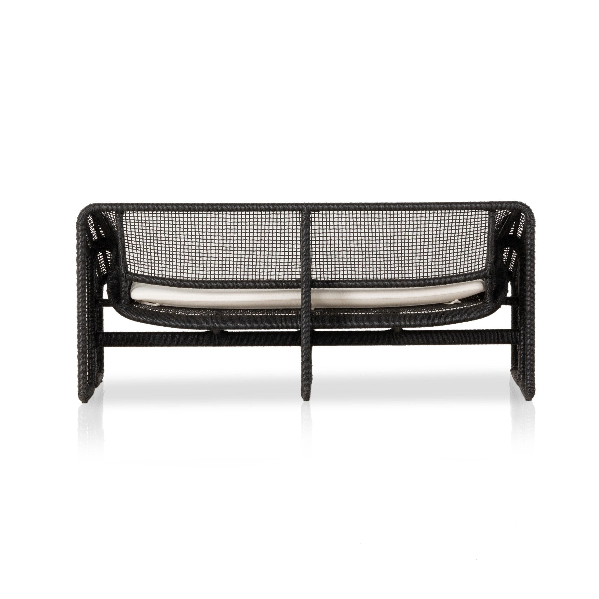 Back view of a faux hyacinth black outdoor sofa with a beige seat cushion