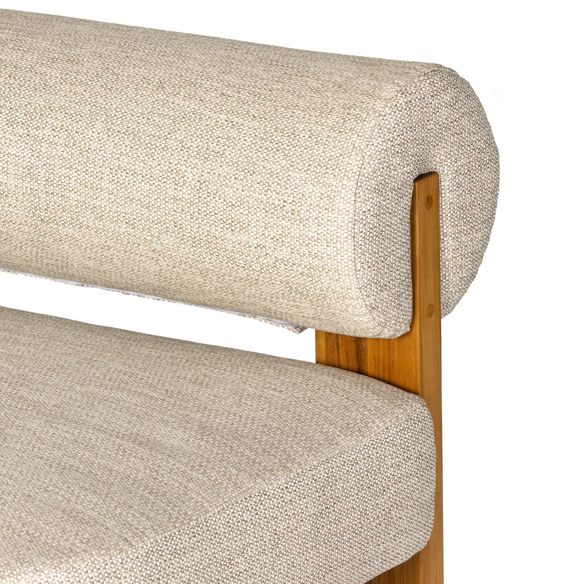 Close-up of a chair with beige fabric and wooden frame on a white background