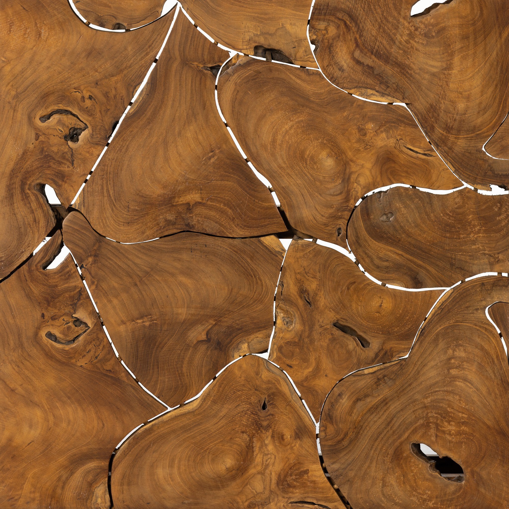 Close-up of a wooden surface with a natural, wavy pattern.