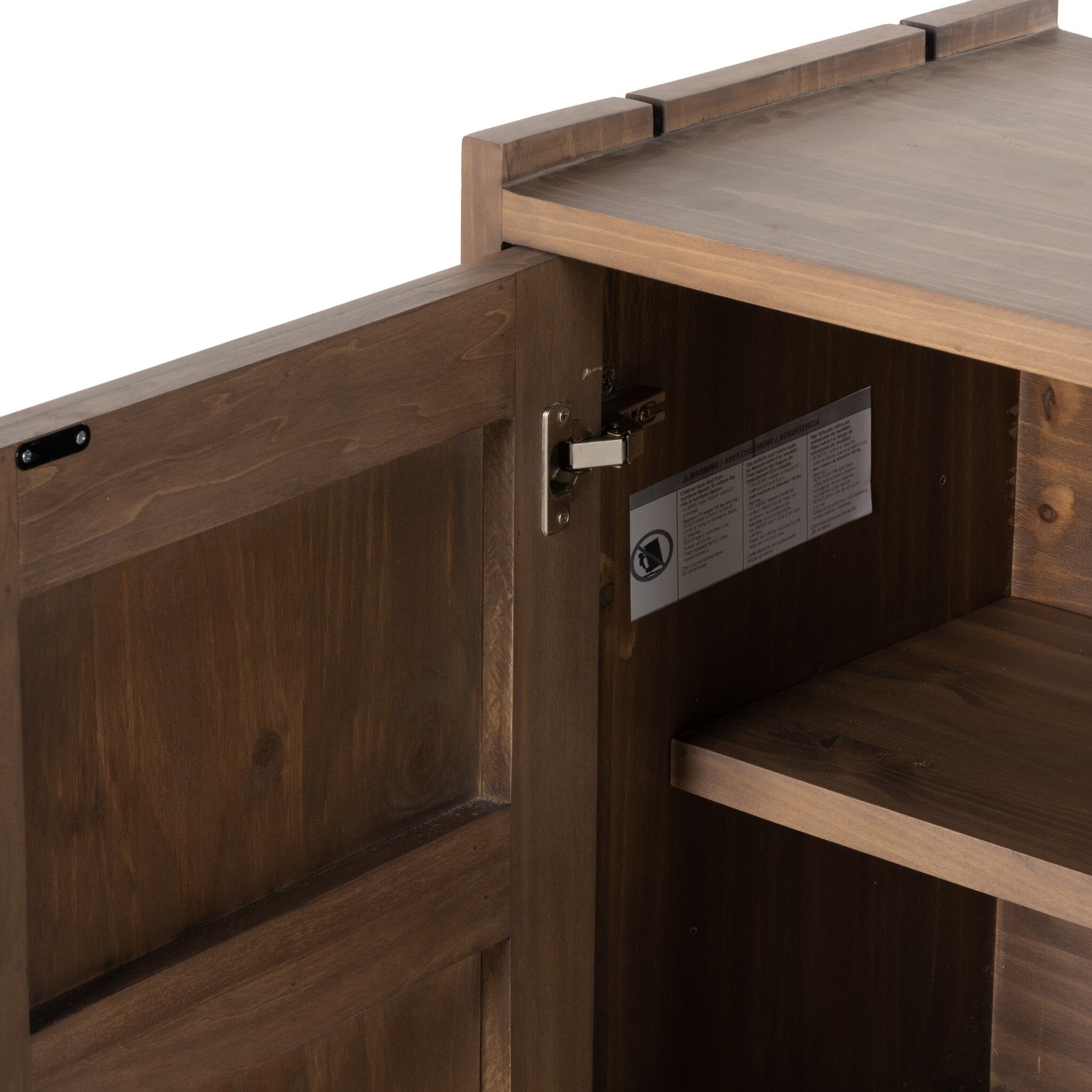 Wooden sideboard with an open shelf showing a label inside.