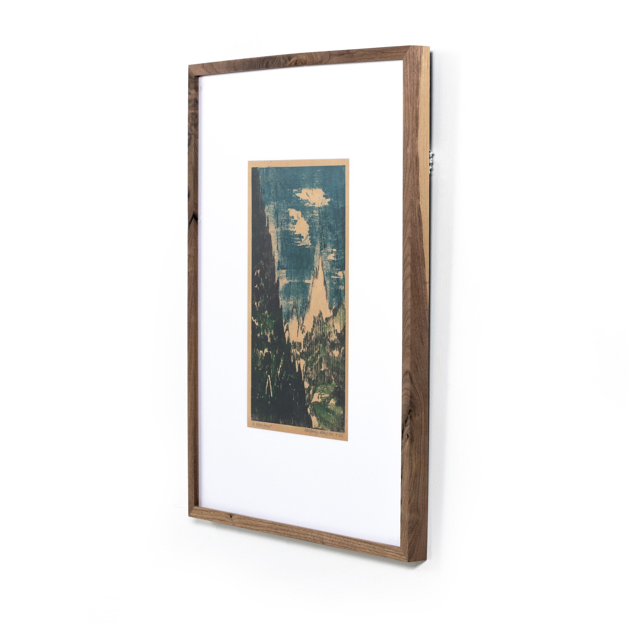 Framed artwork with a wooden frame on a white background
