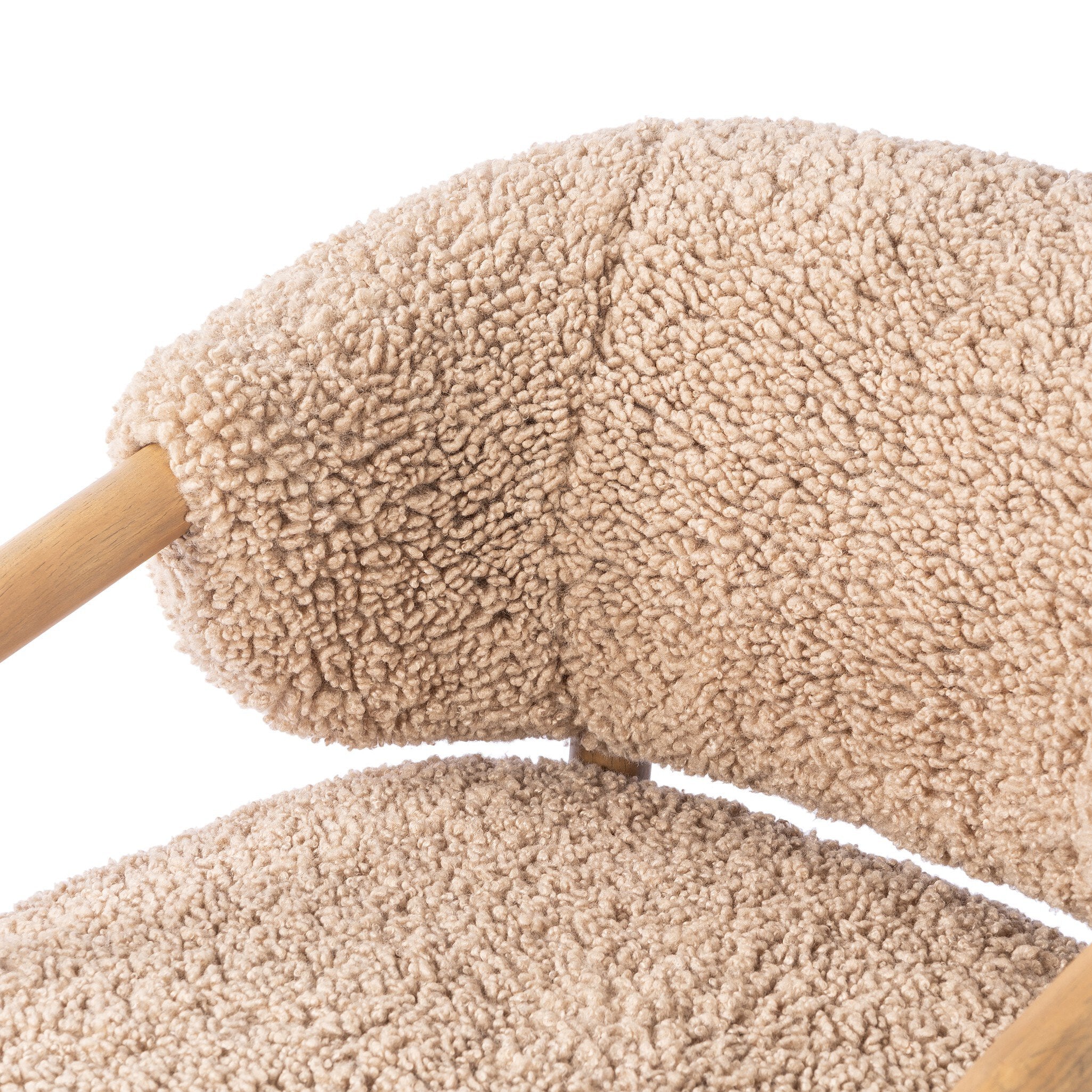 Close-up of a fluffy armchair on a white background